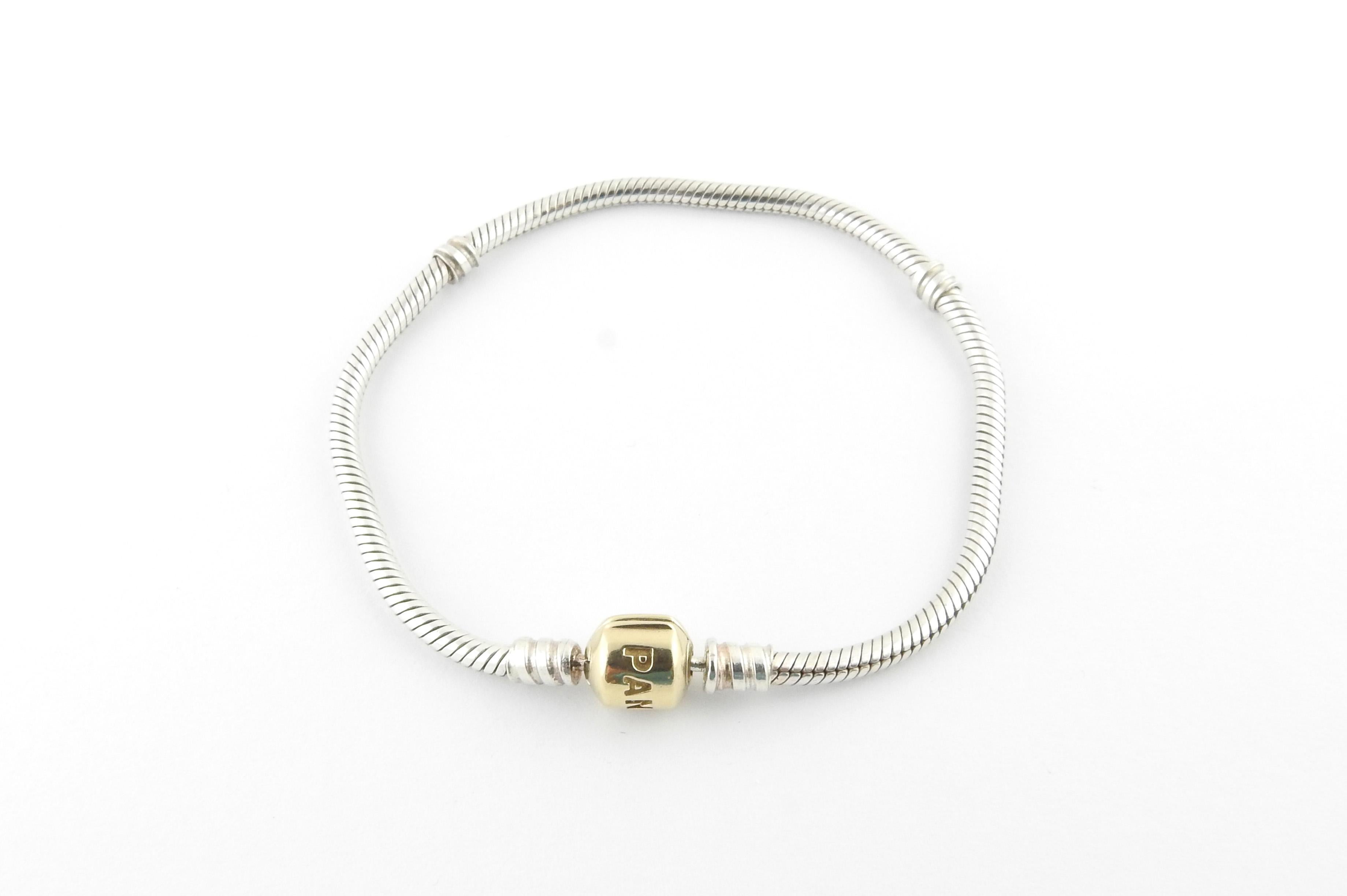 Pandora 14K Yellow Gold Sterling Silver Charm Bracelet

This authentic pandora bracelet is approx. 20cm in length. Measures 7.25