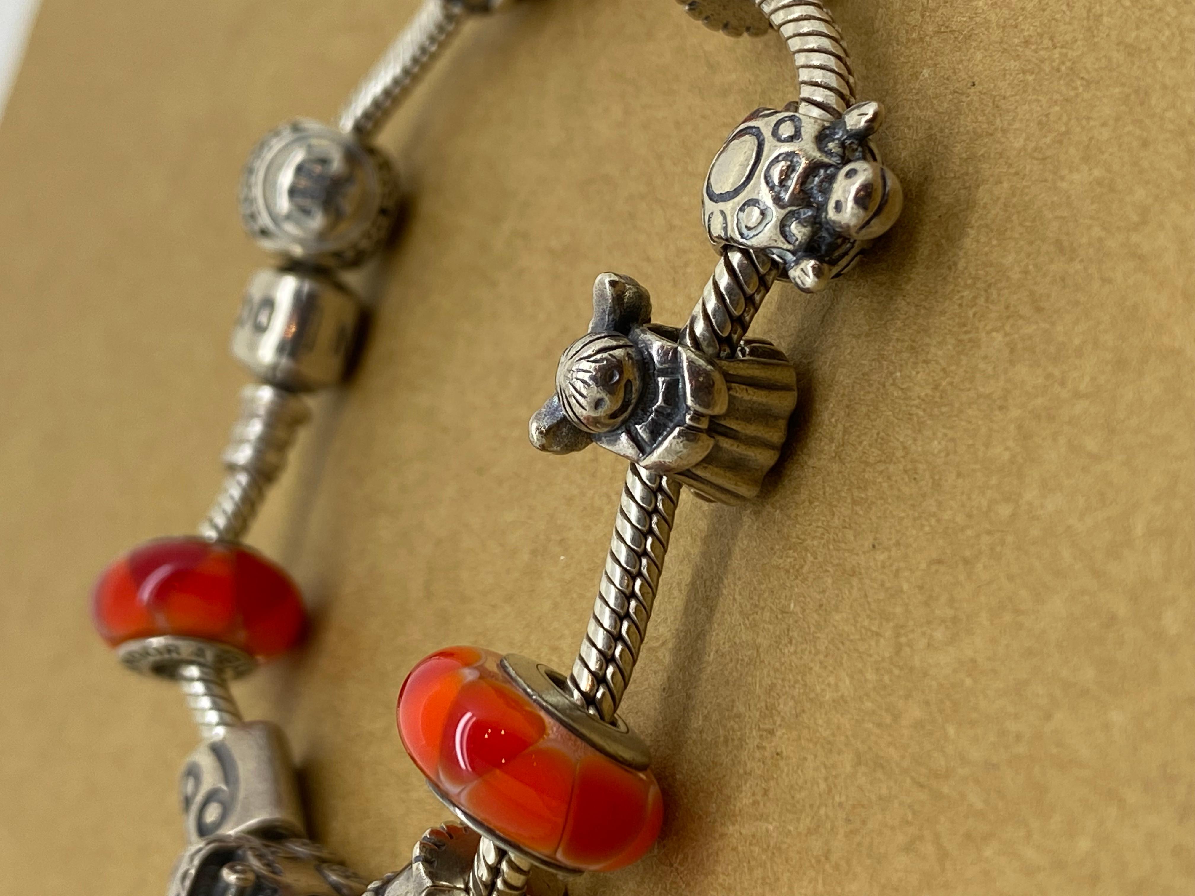 Pandora 925 Sterling Silver Charm Bracelet, 11 Charms, inc. Murano Glass Charms. In Excellent Condition For Sale In MELBOURNE, AU