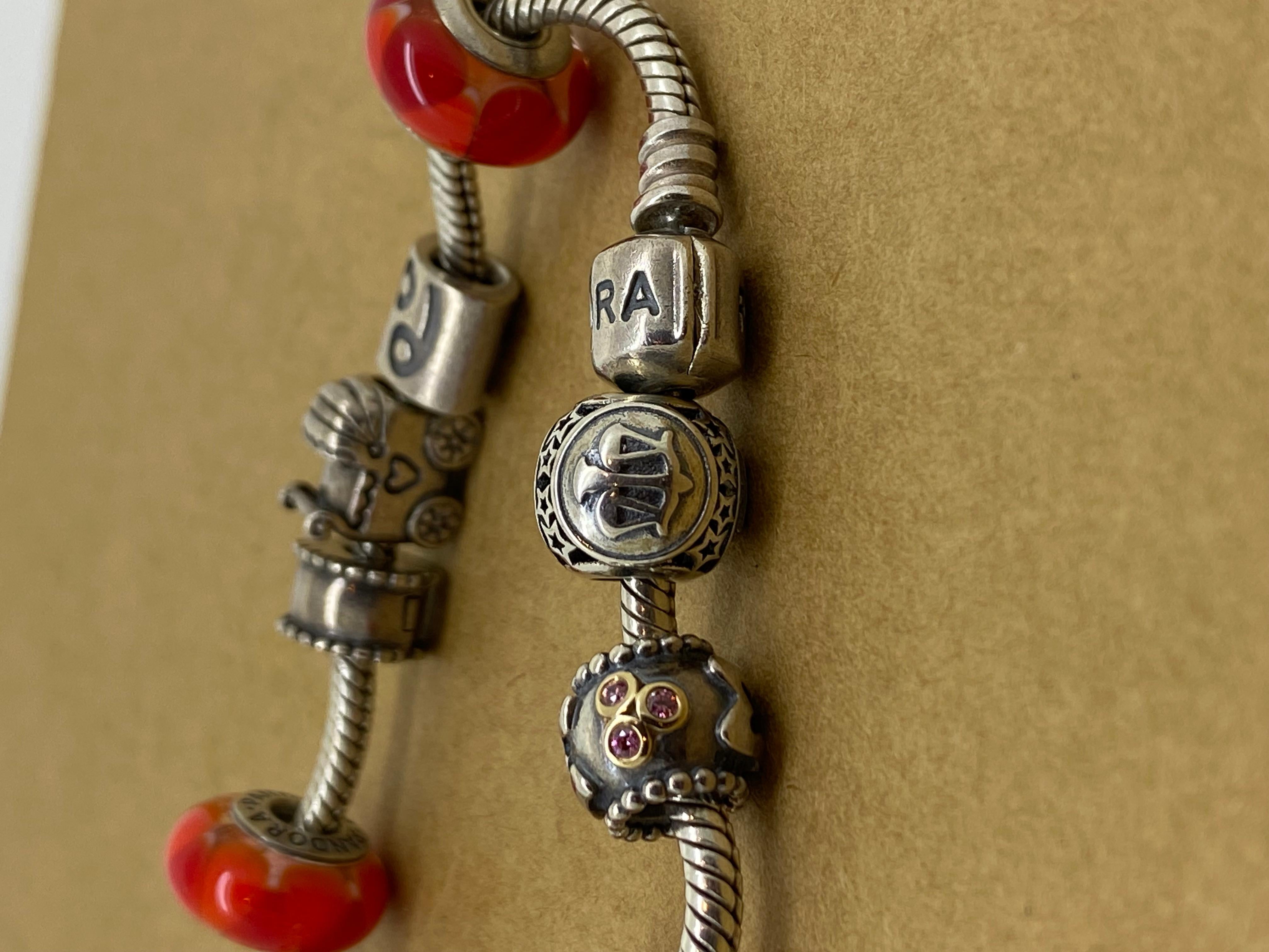 Women's Pandora 925 Sterling Silver Charm Bracelet, 11 Charms, inc. Murano Glass Charms. For Sale