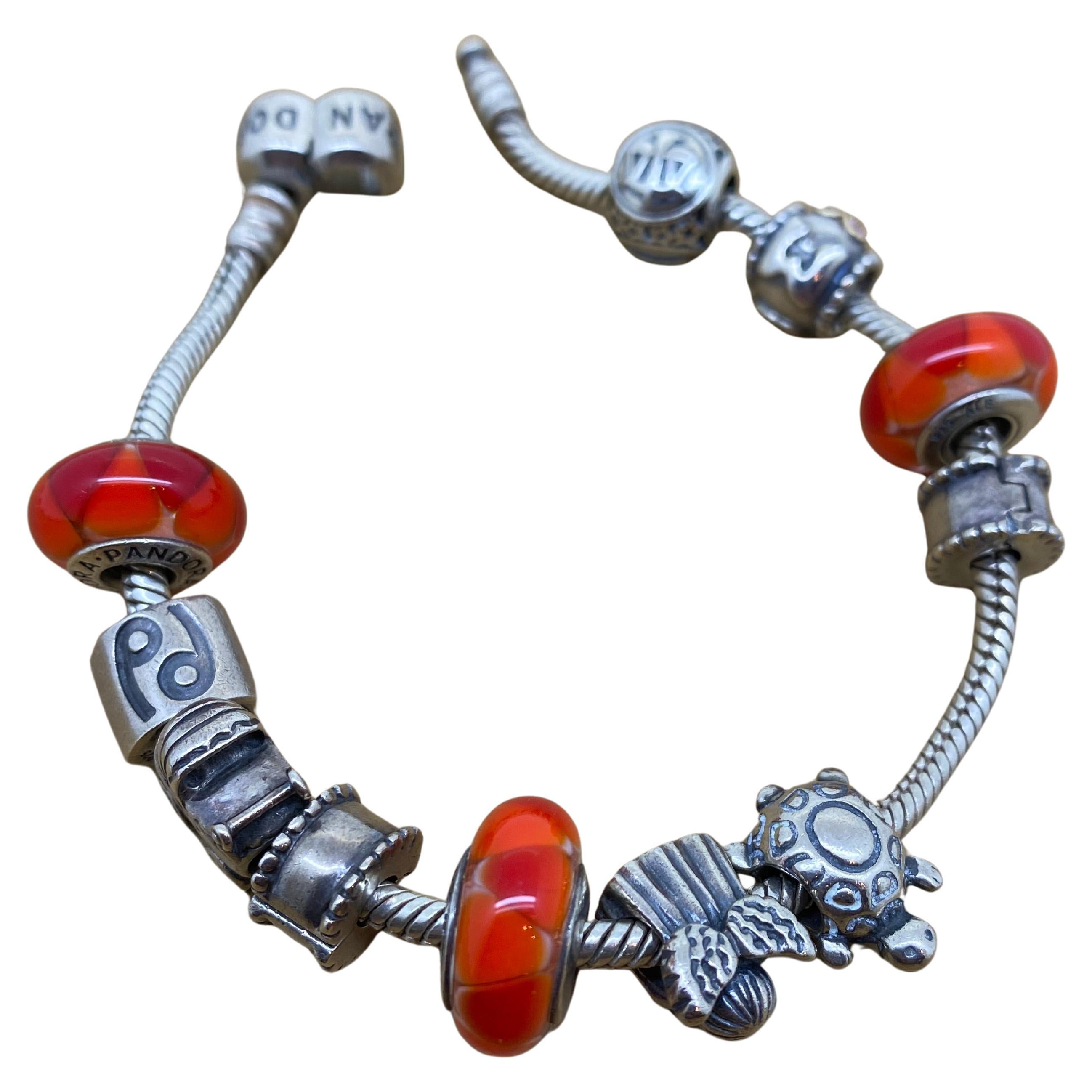 Pandora 925 Sterling Silver Charm Bracelet, 11 Charms, inc. Murano Glass Charms.