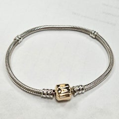 Pandora Bracelet 14Kt and Sterling Silver size 7