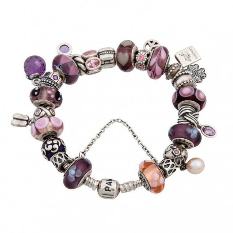 Tlw. With Murano Glass. Silver, 90.7. L. approx. 20 cm, 21st century. Pandora Bracelet with Numerous Charms, Partly Murano Glass. Silver. 90.7 g. L, approx. 20 cm, 21st century, Signs of Wear.
