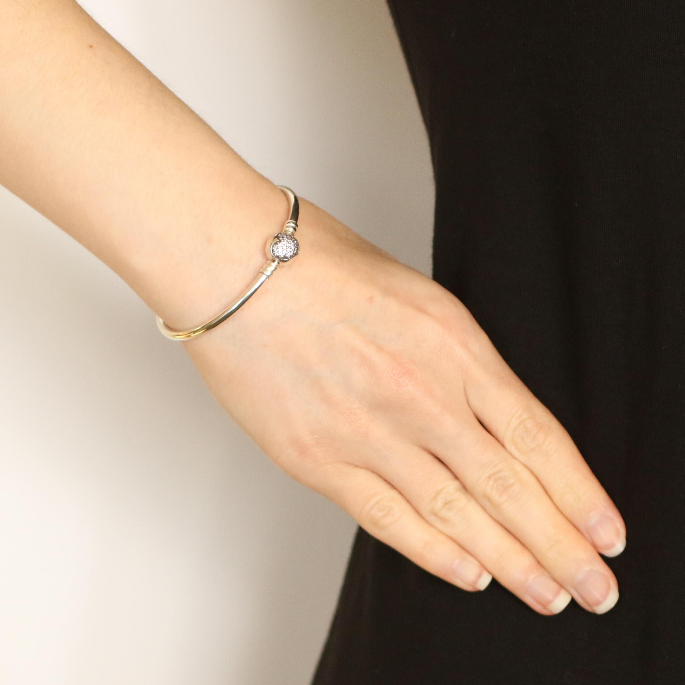 This NEW piece is guaranteed 100% authentic PANDORA, as we recently bought out an authorized PANDORA retailer.

This bracelet comes with a collectors porcelain holder as well as with its original Pandora box.

Brand: Pandora
Number: USB792317
Title: