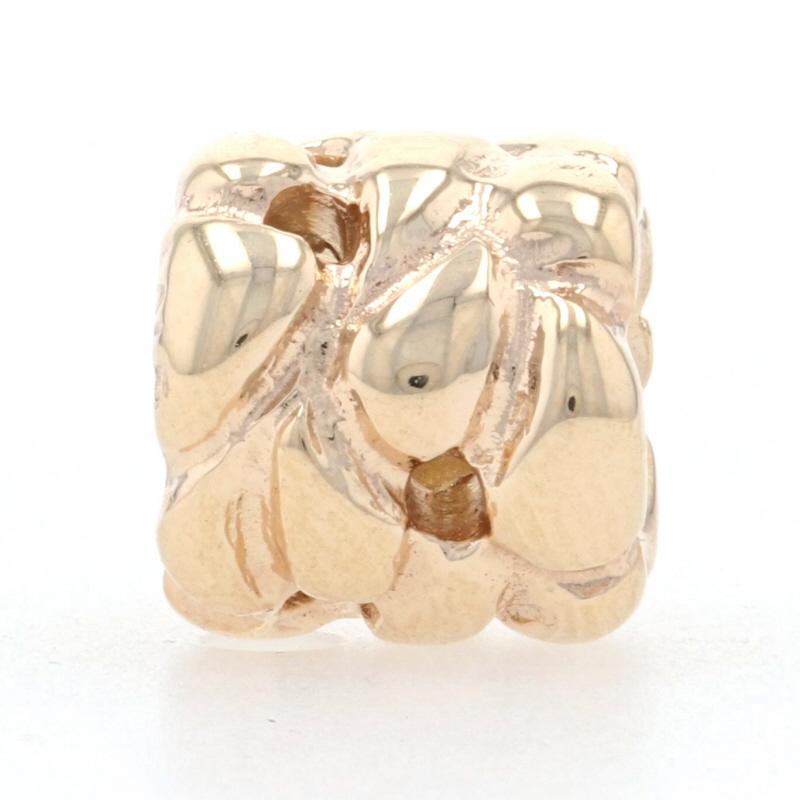 Brand: Pandora (retired)
Number: 750117
Title: Interwoven

Metal Content: 14k Yellow Gold

Measurements: 
Tall: 11/32