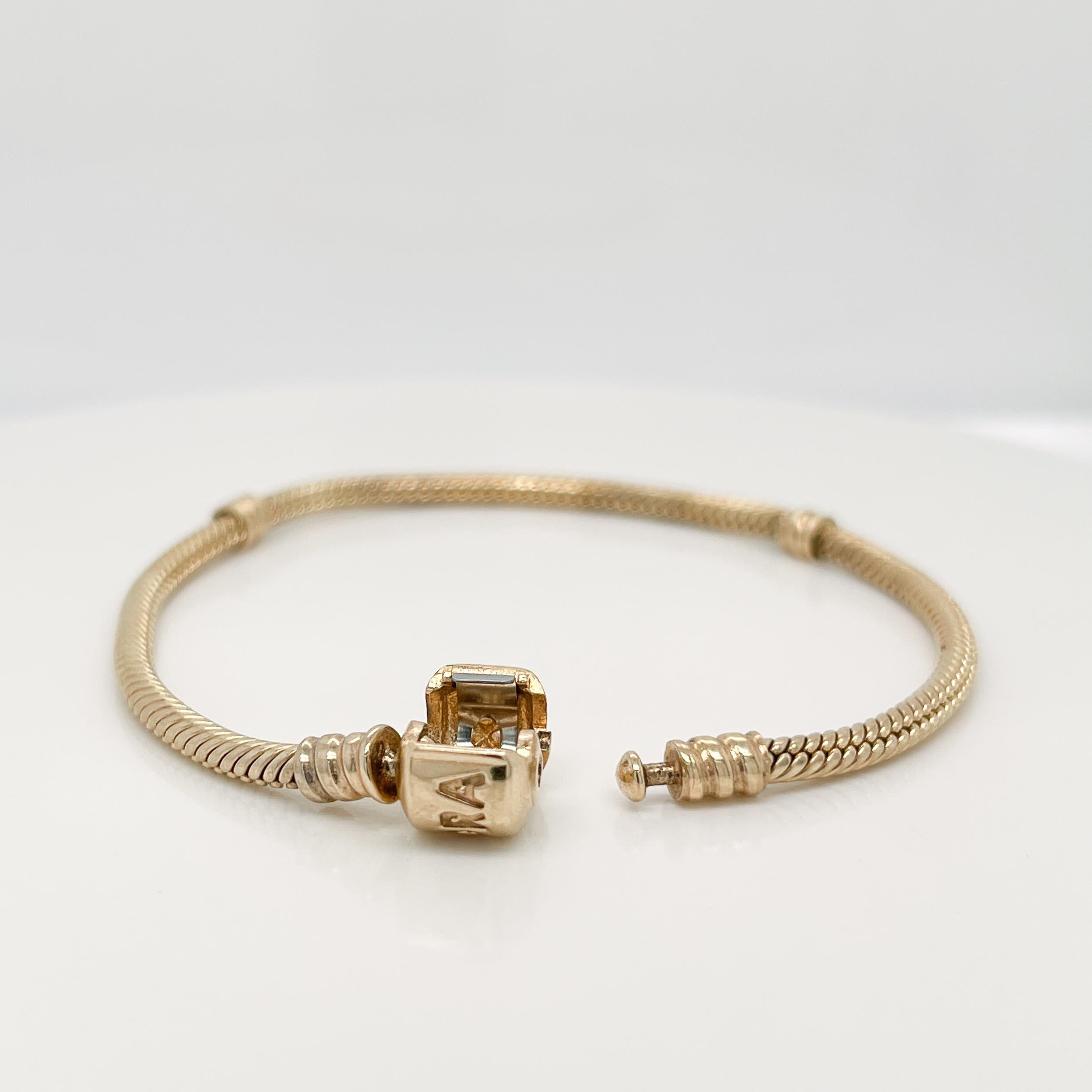Modern Pandora Moments 14K Gold Snake Chain Charm Bracelet For Sale