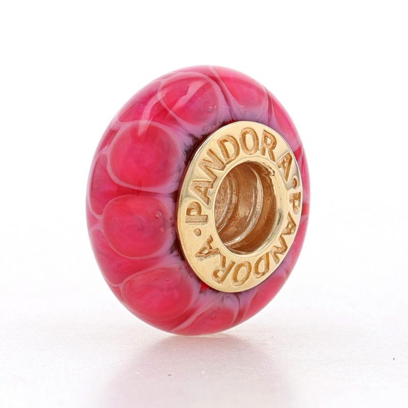 Brand: Pandora
Style Number: 750501
Title: Pink Lotus

Metal Content: 14k Yellow Gold

Material Information
Murano Glass
Color: Pink

Style: Charm

Measurements
Tall: 19/32