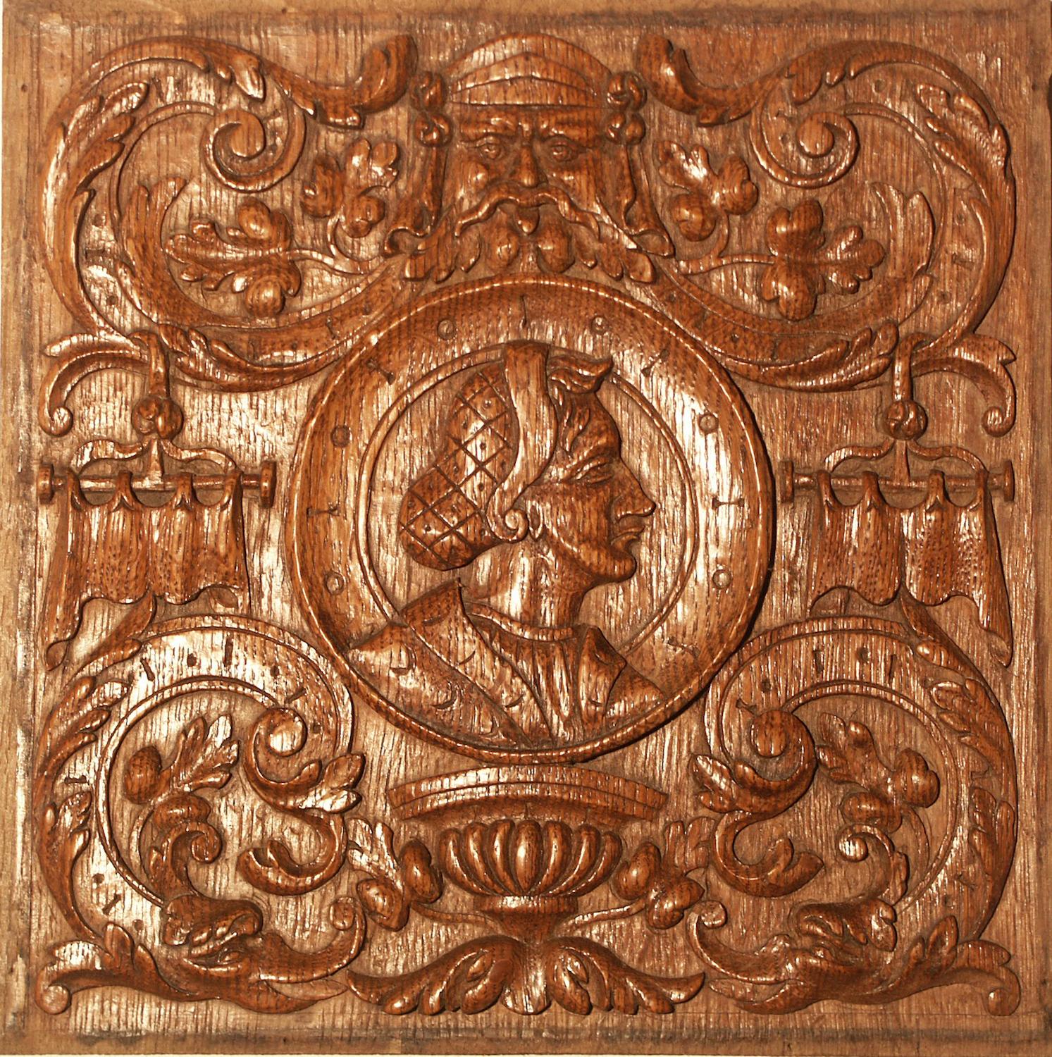 This panel is beautifully carved and has developed a lustrous patina over time.