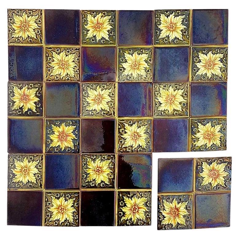 Panneau de 9 carreaux en relief Art Déco émaillés de S.A. Des Pavillions, années 1930