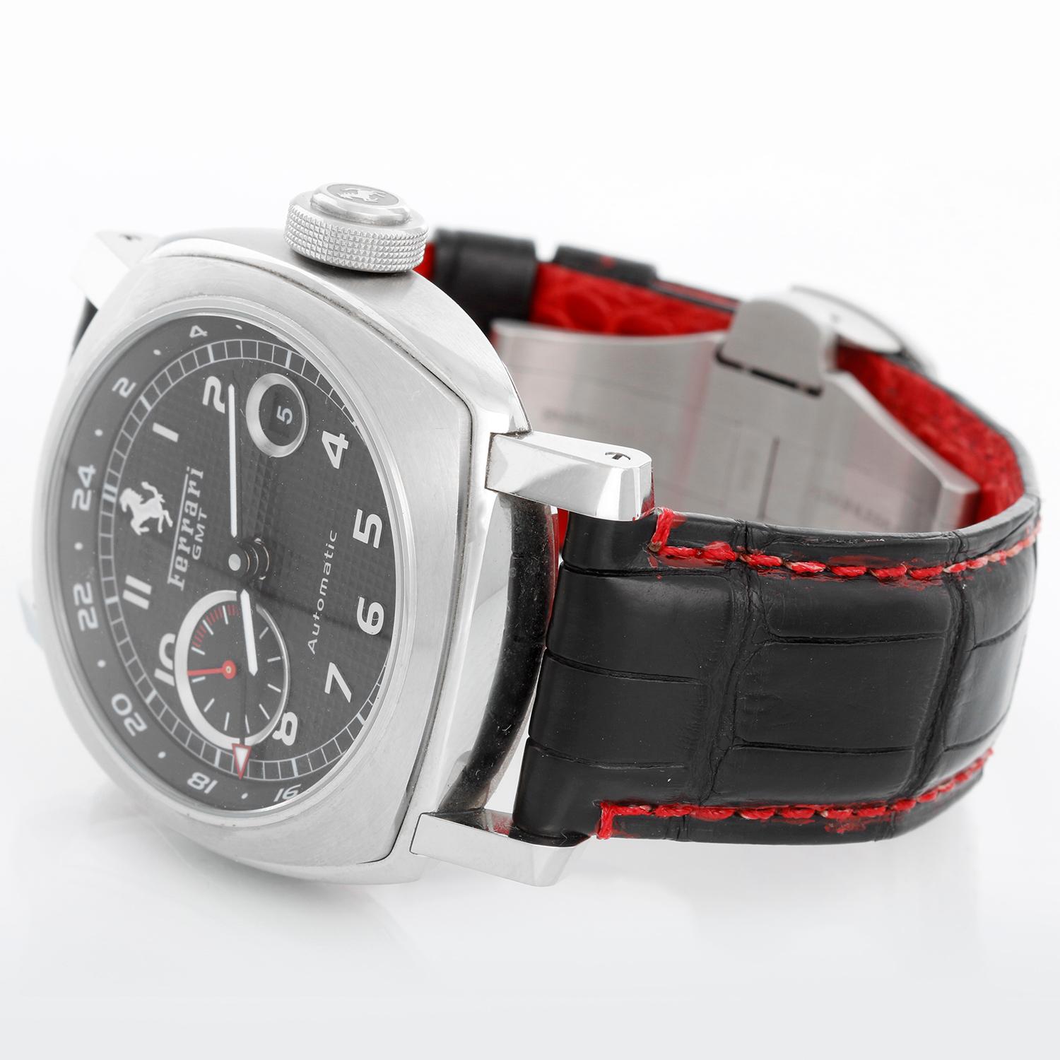 Panerai Ferrari GMT Granturismo Automatic 45MM Watch FER00003 - Automatic. Stainless steel case ( 45 mm ). Black Honeycomb dial with Arabic numerals; Date &  GMT function. Black strap with red stitching with Ferrari Signed Deployant Clasp. Pre-owned