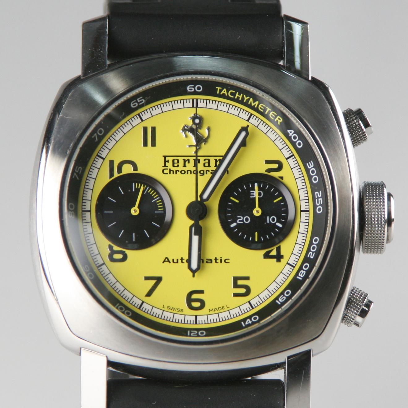 Model #FER00011 
Stainless Steel Case
43 mm in Diameter (47 mm w/ Crown)
Lug-to-Lug Distance = 55 mm
Thickness = 14 mm
Yellow Chronograph Dial w/ Beveled Tachymeter
Features Trademark Ferrari Logo at 12:00
Labeled 