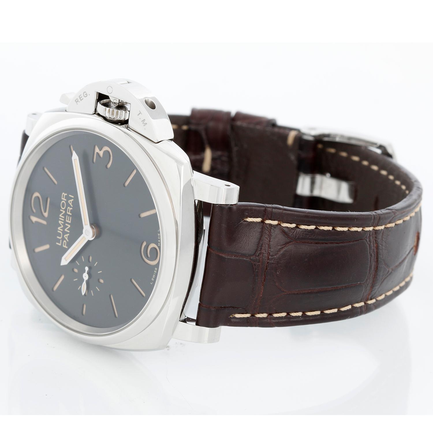 Panerai Luminor Due 3-Day 42mm Men's Watch - Manual winding 3-Day Power Reserve. Stainless Steel case ( 42 mm). Black dial. Brown Panerai strap band with white stitching. Pre-owned with Panerai Box 