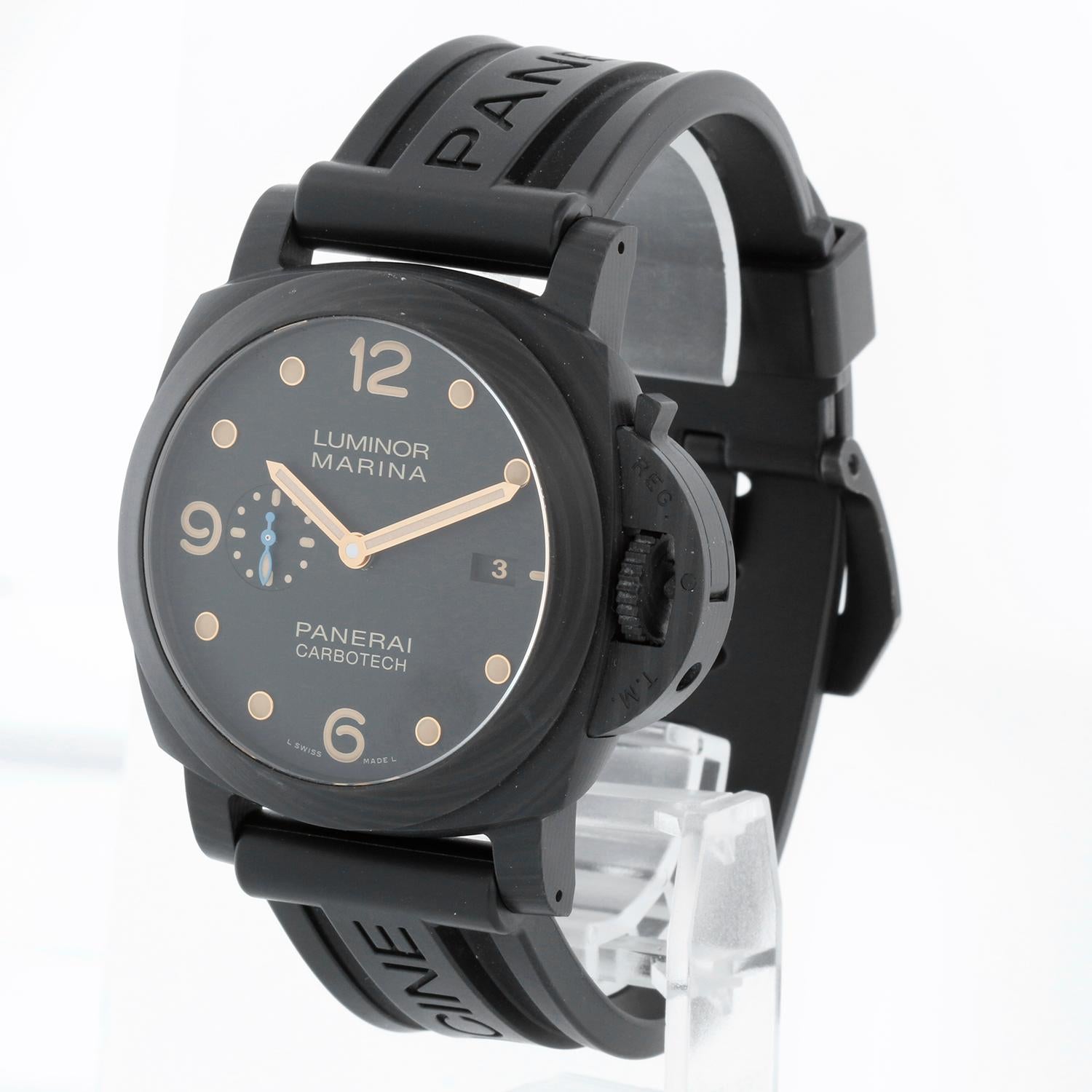 Panerai Luminor Marina 1950 3 Days Automatic Men's Watch  - Automatic Movement. Black Carbon Case with a Black Carbon Fiber Bezel ( 47 mm ) . Black dial with date feature . Black rubber band with tang buckle; extra brown leather strap .  Limited