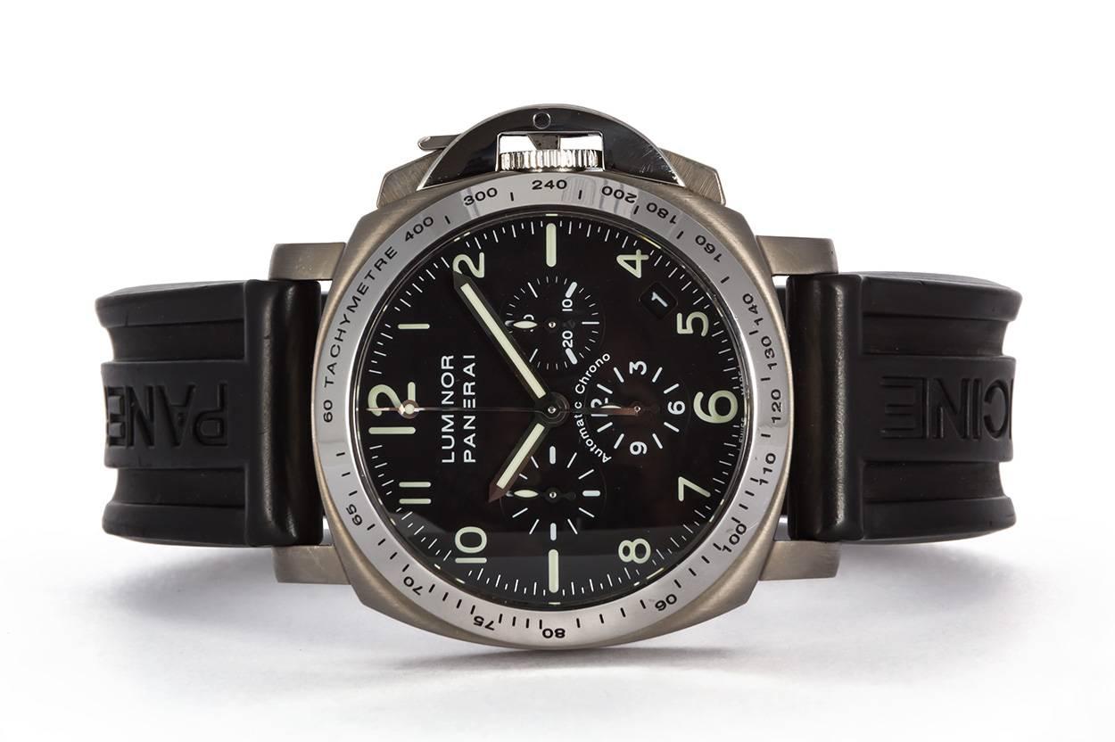 Panerai Luminor Marina Chronograph PAM 74. This stylish mens watch was limited in production to only 1500 pieces. It features a 40mm titanium case, black dial with luminous arabic markers, black rubber deployent strap and a very special Zenith El