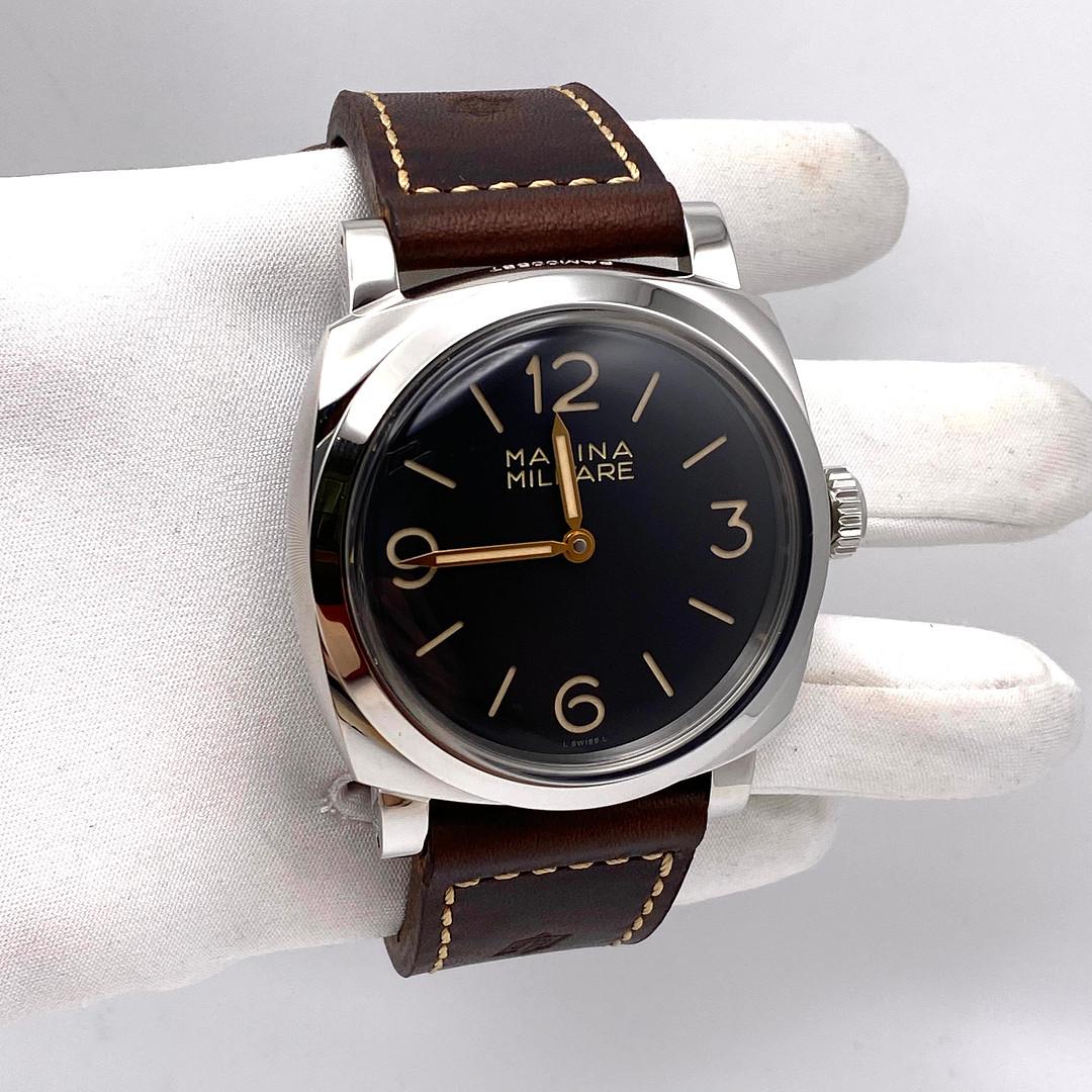 This Panerai Radiomir 1940 Marina Militare is crafted in a polished steel case measuring 47mm. The dial is black with luminous Arabic numerals and hour markers. The watch comes on a dark brown calf ponte vecchio strap with a steel buckle.

*Limited