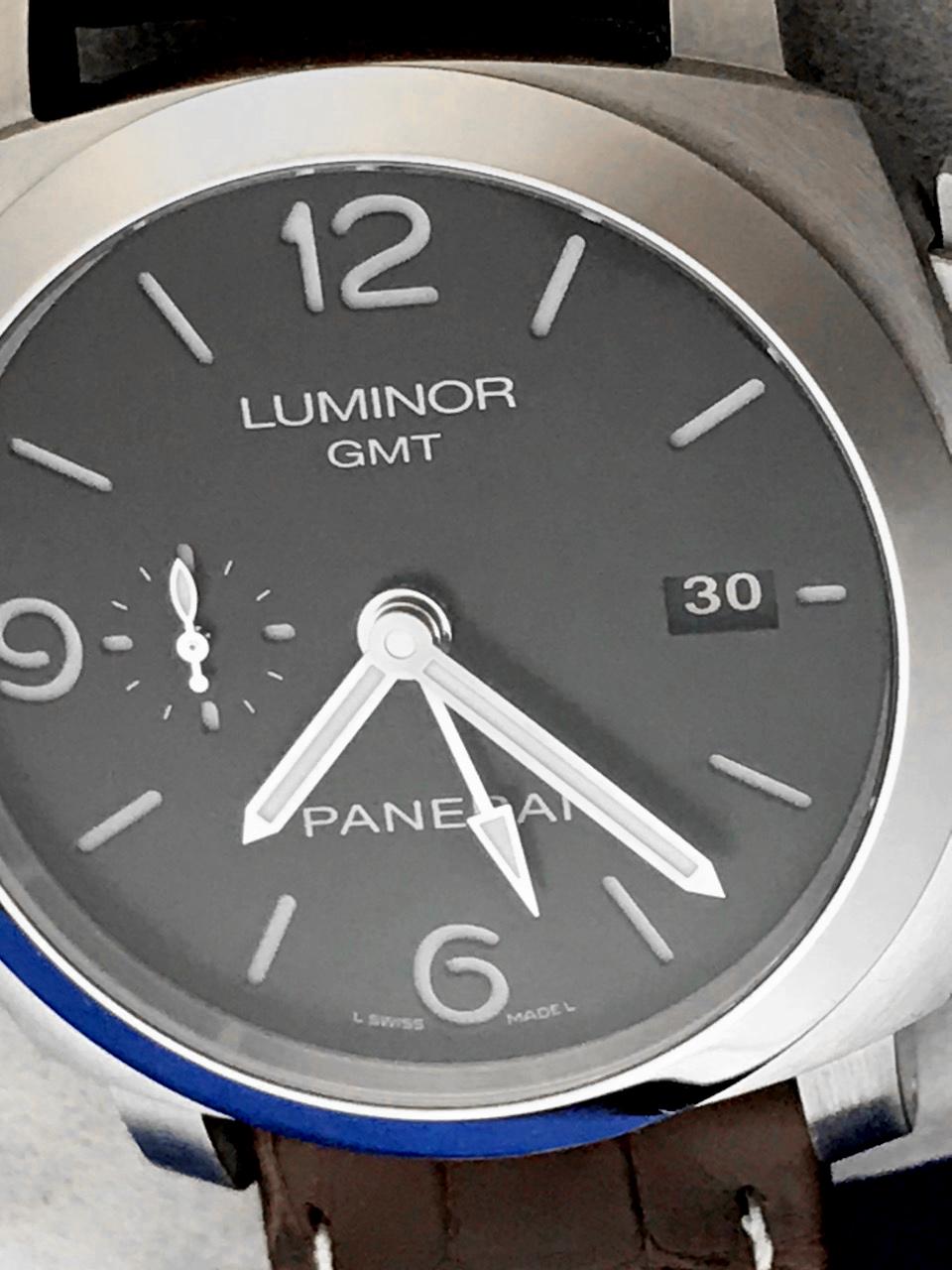 The Panerai Luminor 1950 GMT Limited Edition PAM00320 certified pre-owned automatic men's wrist watch. Limited Series of 1200 Individually Numbered Pieces. Black 