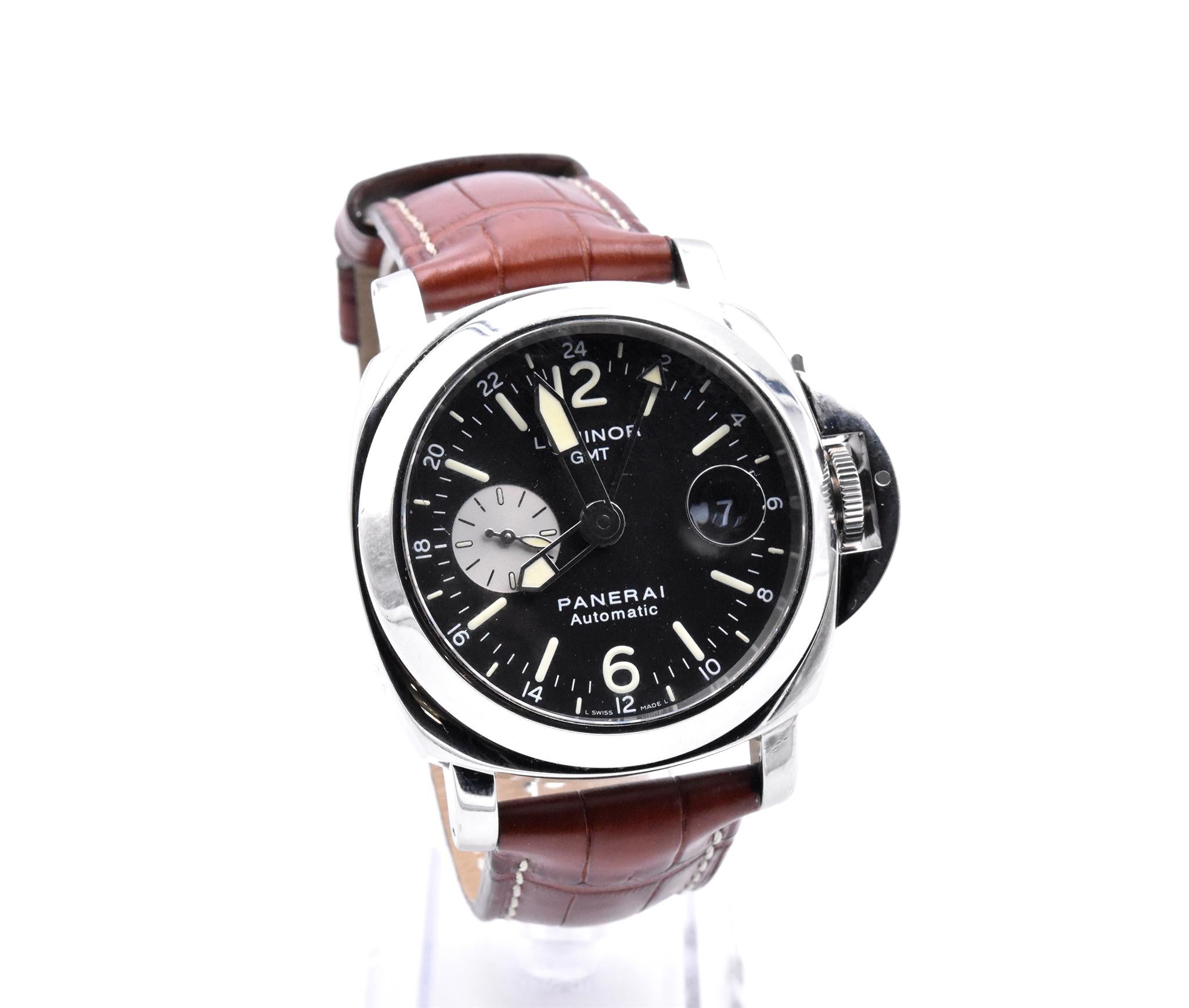 Movement: manual wind movement
Function: Hours, minutes, small seconds, date, GMT
Case: 44mm stainless steel case, sapphire crystal, smooth bezel, push-pull crown
Band: Brown Leather and Black Rubber Strap
Dial: Black GMT dial, date at 3 o’clock