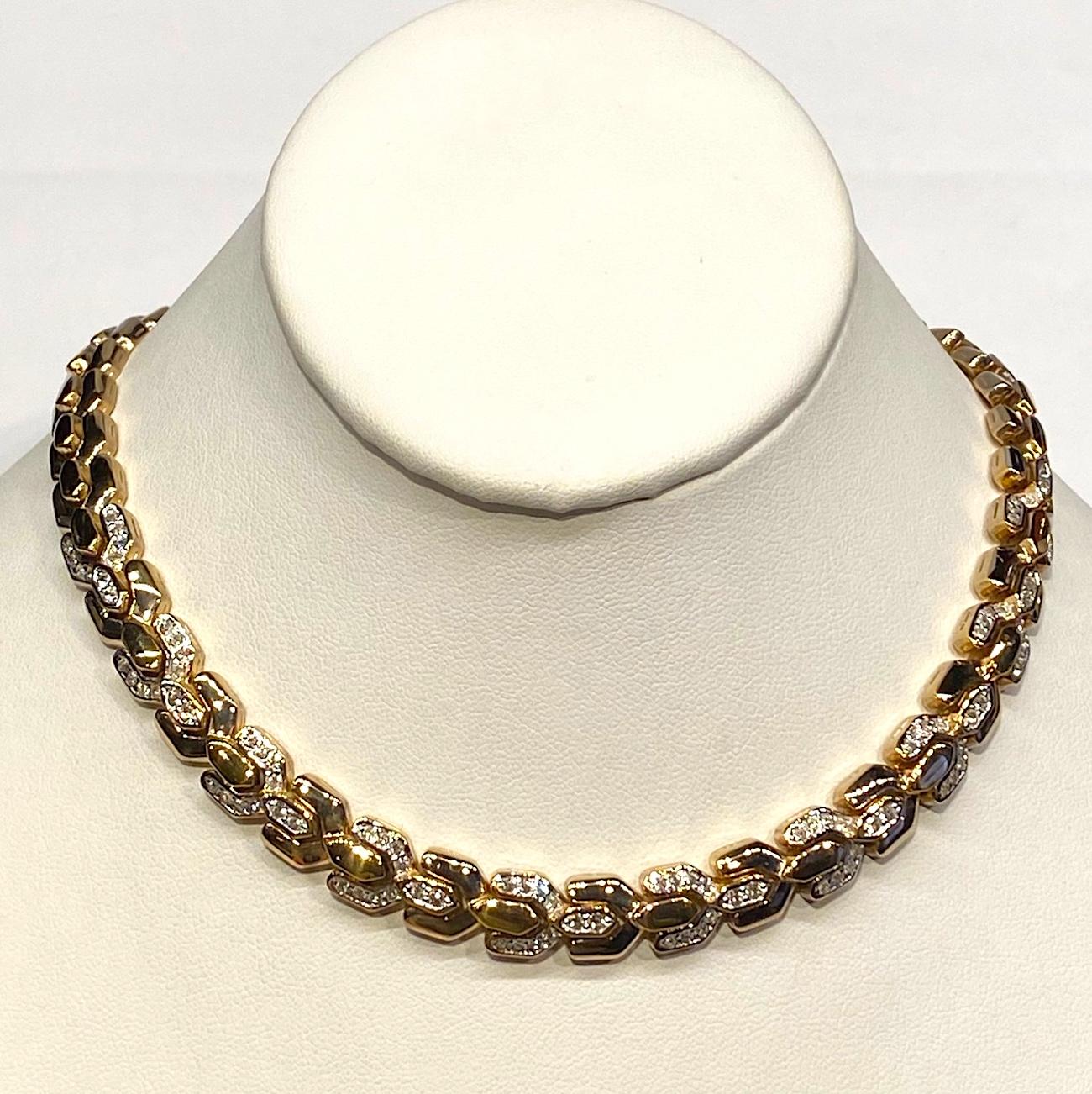 A classic style necklace in gold with rhinestone accent by Panetta circa 1980. The link is unusual in that it is a Y shape turned on its side to interlock with the ones before and after. The necklace has a wearable length of 15.5 inches in length