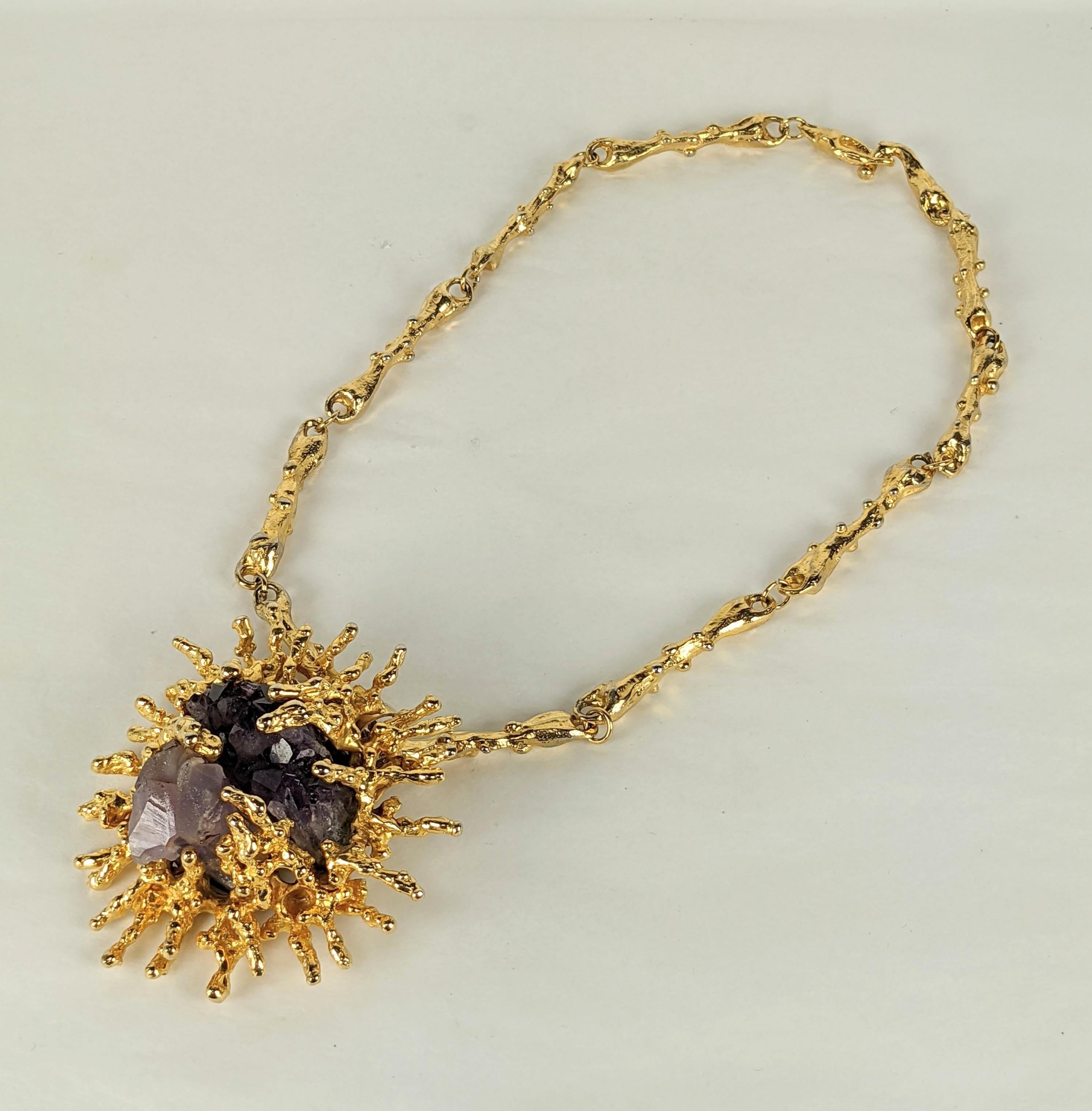  Brutalist sculpted pendant necklace by Panetta. Natural Amythest crystals are surrounded by sculpted abstract gold metal branch coral shaped formations. Massive scale with original abstract coral branch link chain. Excellent condition. Unsigned.