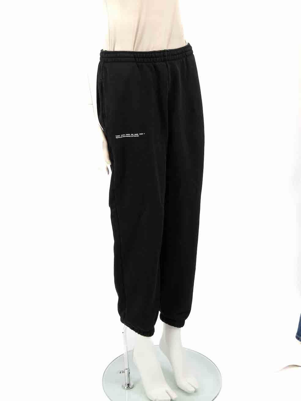 ConditionCONDITION is Very good. Hardly any visible wear to trousers is evident on this used Pangaia designer resale item.Details
 
  Black
 
 
  Cotton
 
 
  Track trousers
 
 
  Elasticated cuffs
 
 
  Elasticated waistband with drawstring
 
 
 