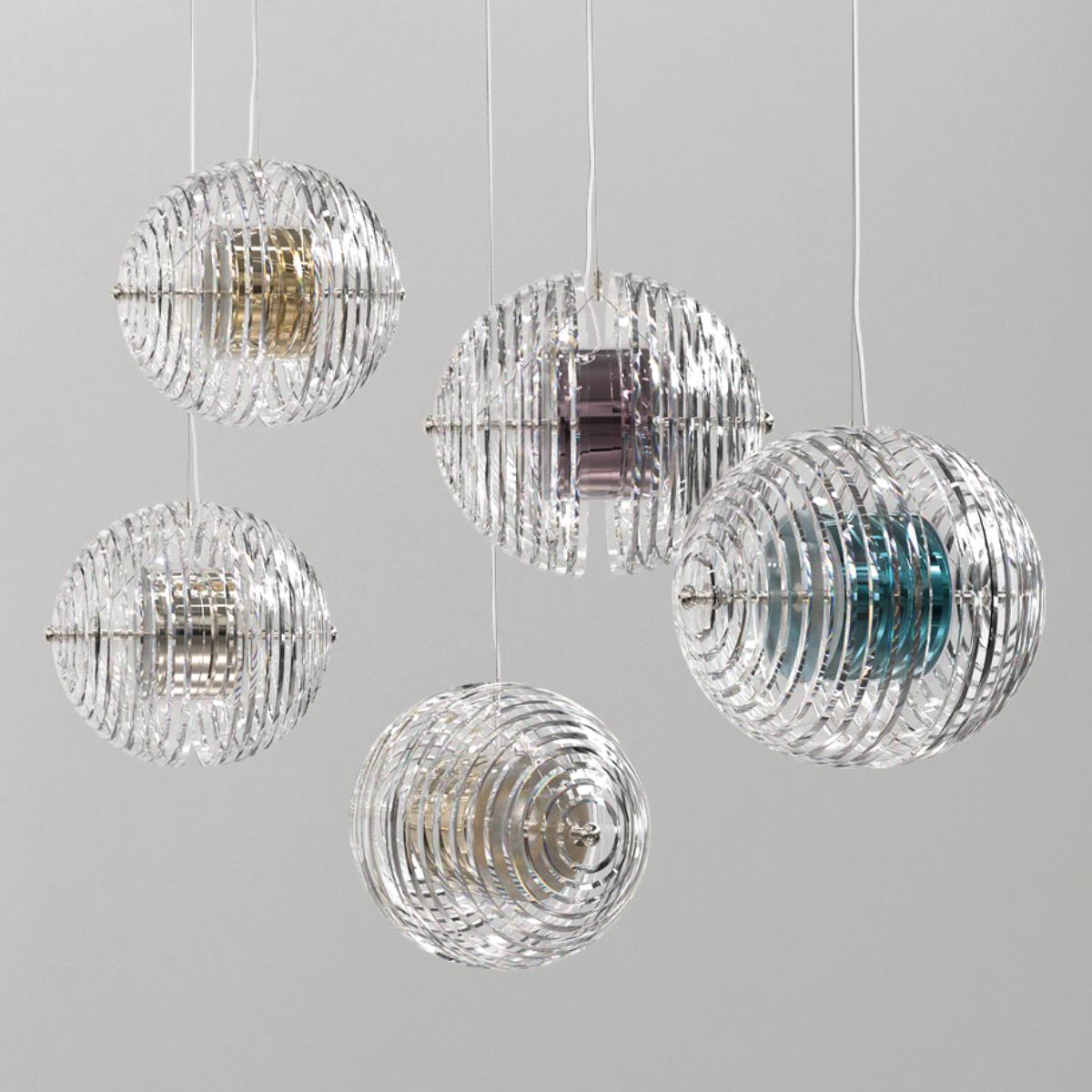 Two continents separate to reveal a shining core.
Glowing beneath the transparent crust of purest crystal.
The light is refracted through cut lines, to cast a stunning light.

The new version of the successful Pangea collection.

Pangea