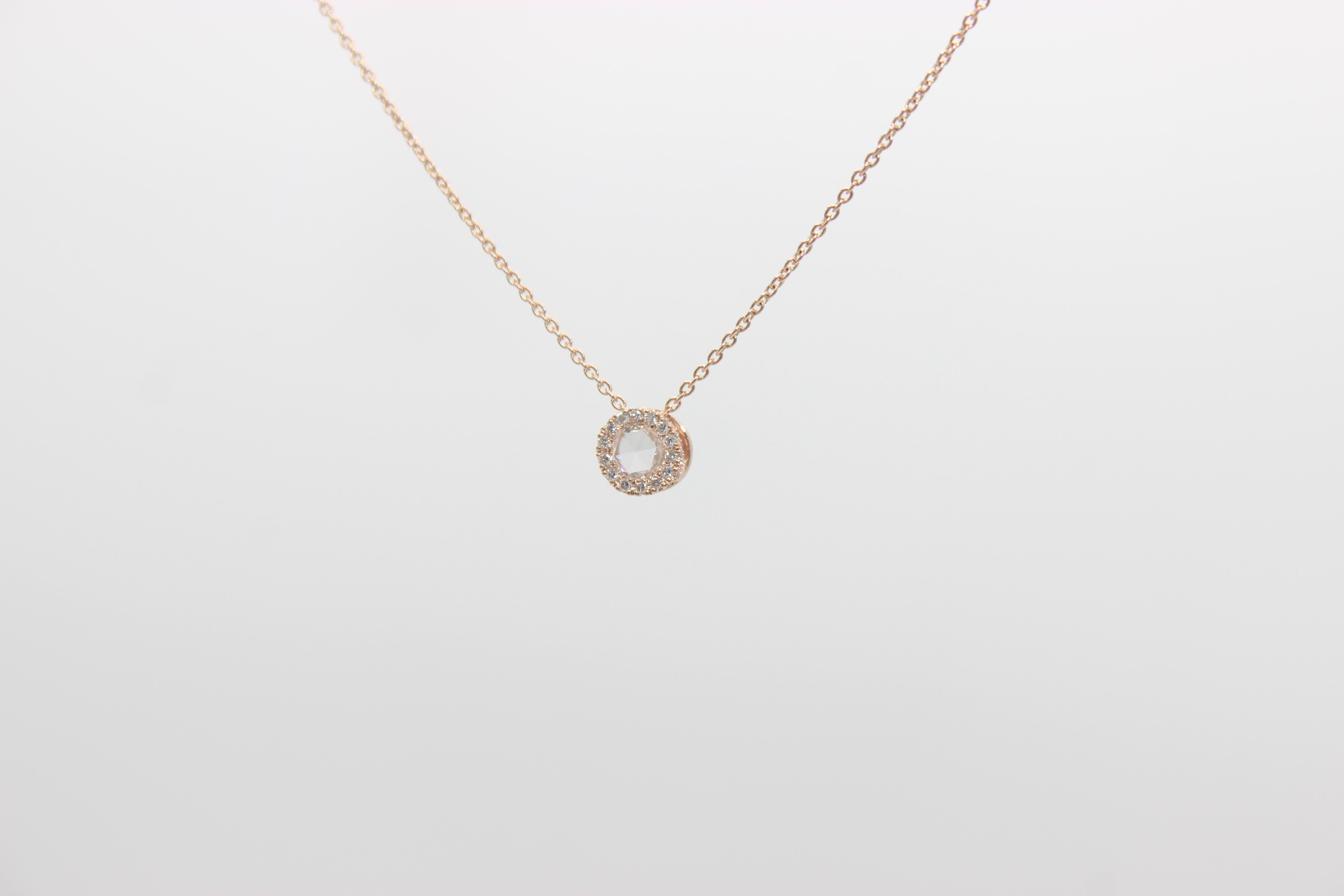 Panim 0.22 Rosecut DropPendant Necklace in 18K Rose Gold

The pristine 3mm 0.10 carat rose-cut diamond enclosed in a row of delicate micro-pave set brilliant cut diamonds can be worn alone, or gradually collected and stacked together over