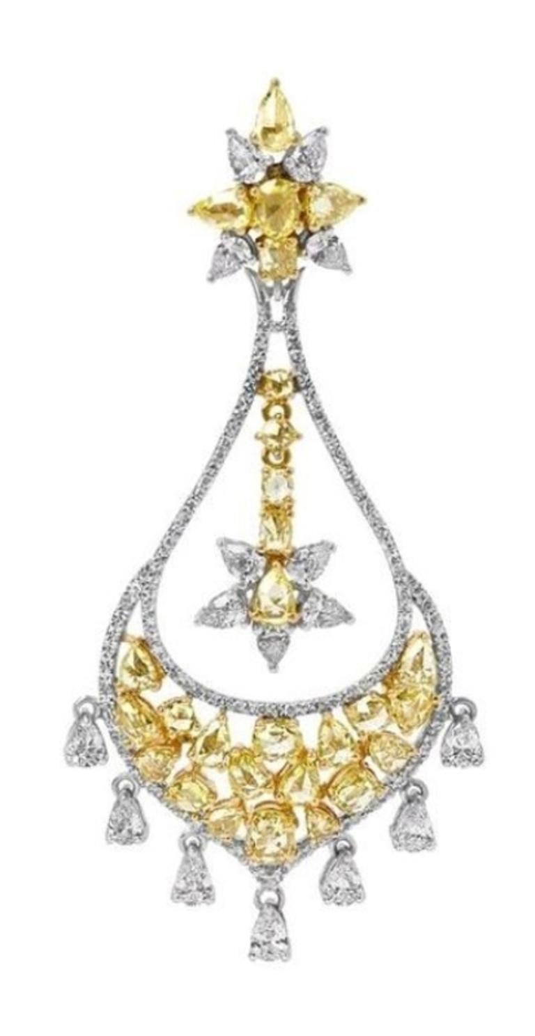 PANIM 12.77 Carat Diamond Rosecut 18K Chandelier Earrings

Chandelier Charms. 
Typically a layered earing that adds charm and grace to enhance your look. 
A melange of Natural Fancy Yellow Rose cut diamonds and pave set brilliants.

Diamonds : 12.77