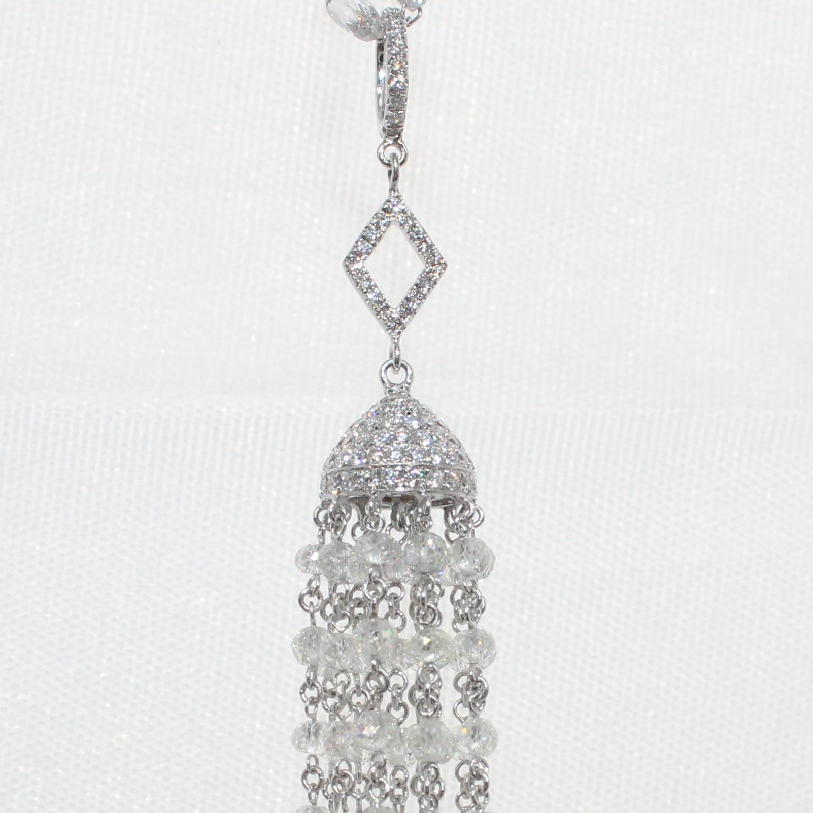 PANIM 14.52 Carat Diamond Beads Tassel Pendant in 18K White Gold

Pendant crafted from Fine Diamond Beads and Small Round Diamonds set in micro pave set for having a look of Classic Tassel Pendant which can be worn everyday as well as for a cocktail