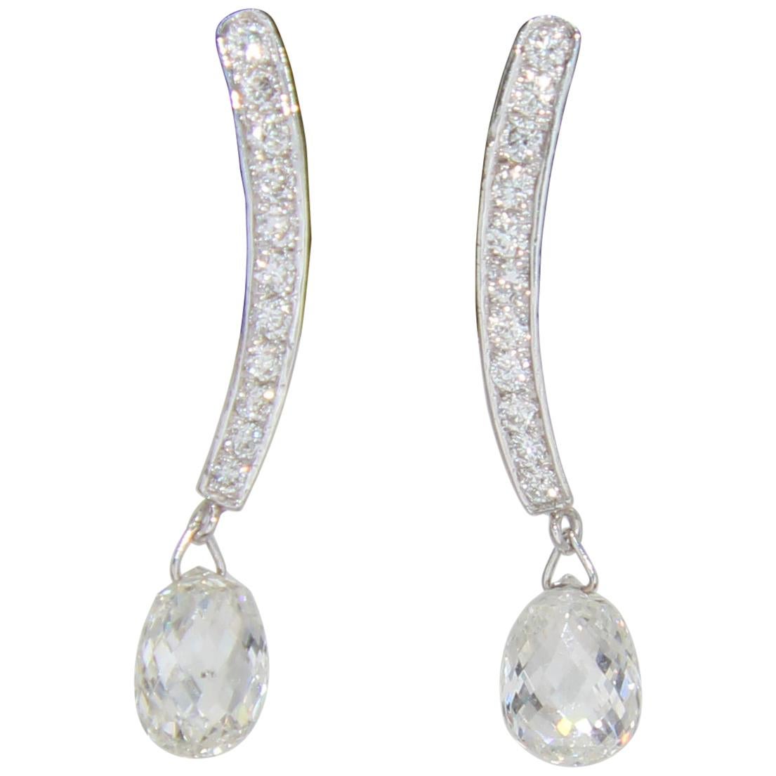 Sure to set your look apart from the rest, these exquisite drop earrings sparkle with Briolette-cut diamonds .With ease and elegance, these classic Briolette drop earrings complete her tailored anytime attire. Fashioned in 18K White gold, these