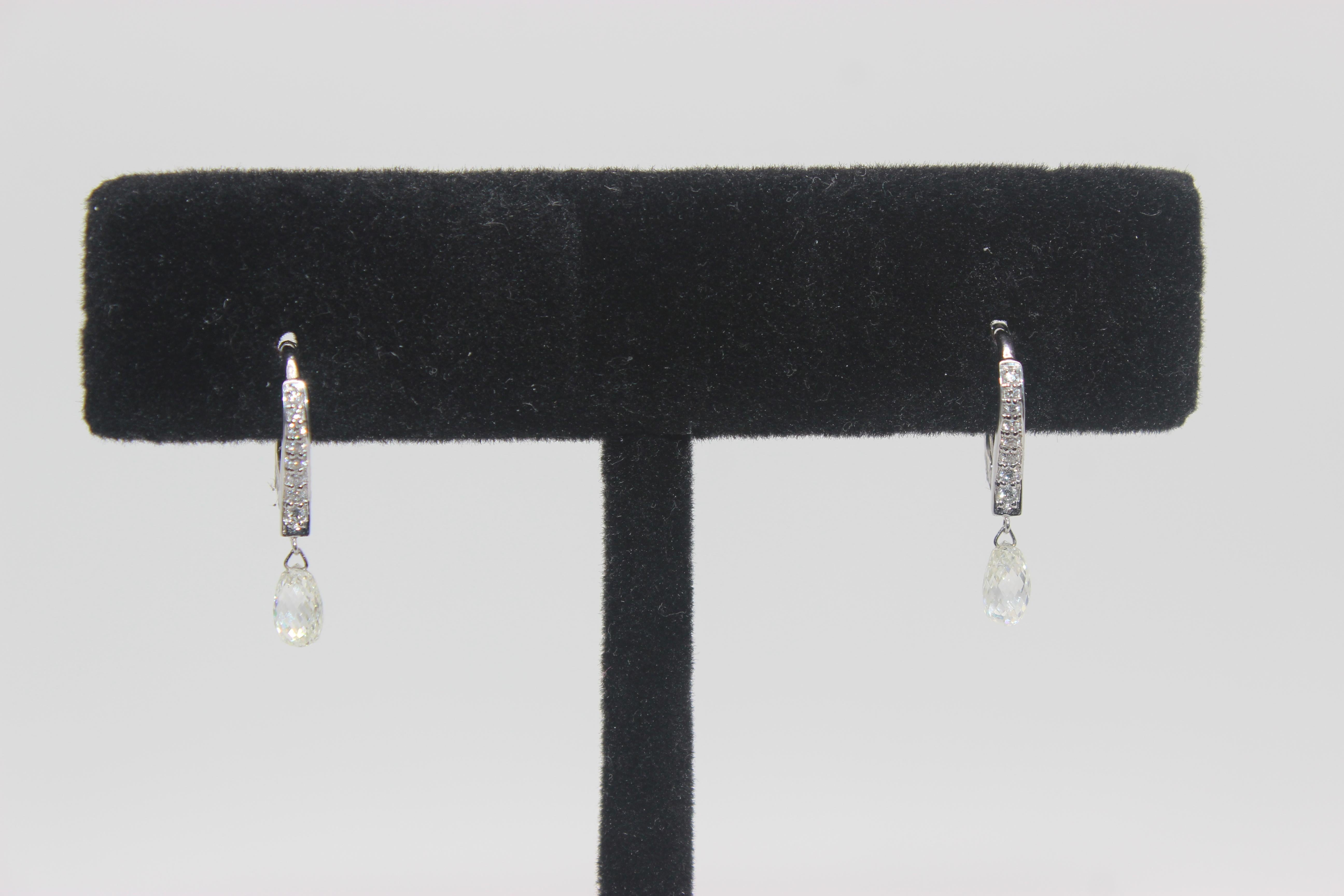Sure to set your look apart from the rest, these exquisite drop earrings sparkle with Briolette-cut diamonds .With ease and elegance, these classic Briolette drop earrings complete her tailored anytime attire. Fashioned in 18K White gold, these