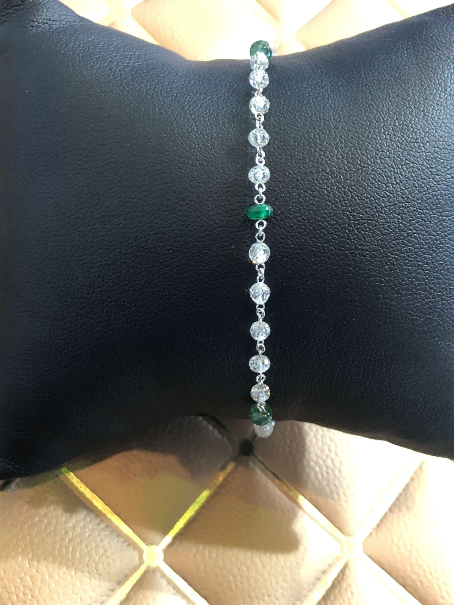 PANIM  18k White gold Diamond Beads & Emerald bracelet

5.80 carats of White Beads-cut Diamonds set in 18KT White gold weighing. It features 5 diamond beads and 1 emerald bead. This Bracelet can be worn everyday.

Available in 18K white, yellow and
