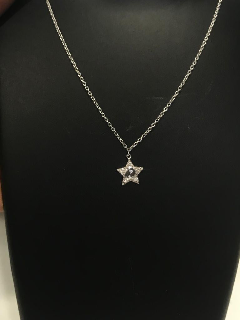 PANIM 18K White Gold Diamond Rosecut Star Necklace

Timeless and dainty, 18K solid gold pave set diamonds & small star charm hanging form a link necklace. A perfect necklace by itself or layered, wear it day or night, up or down. This necklace is