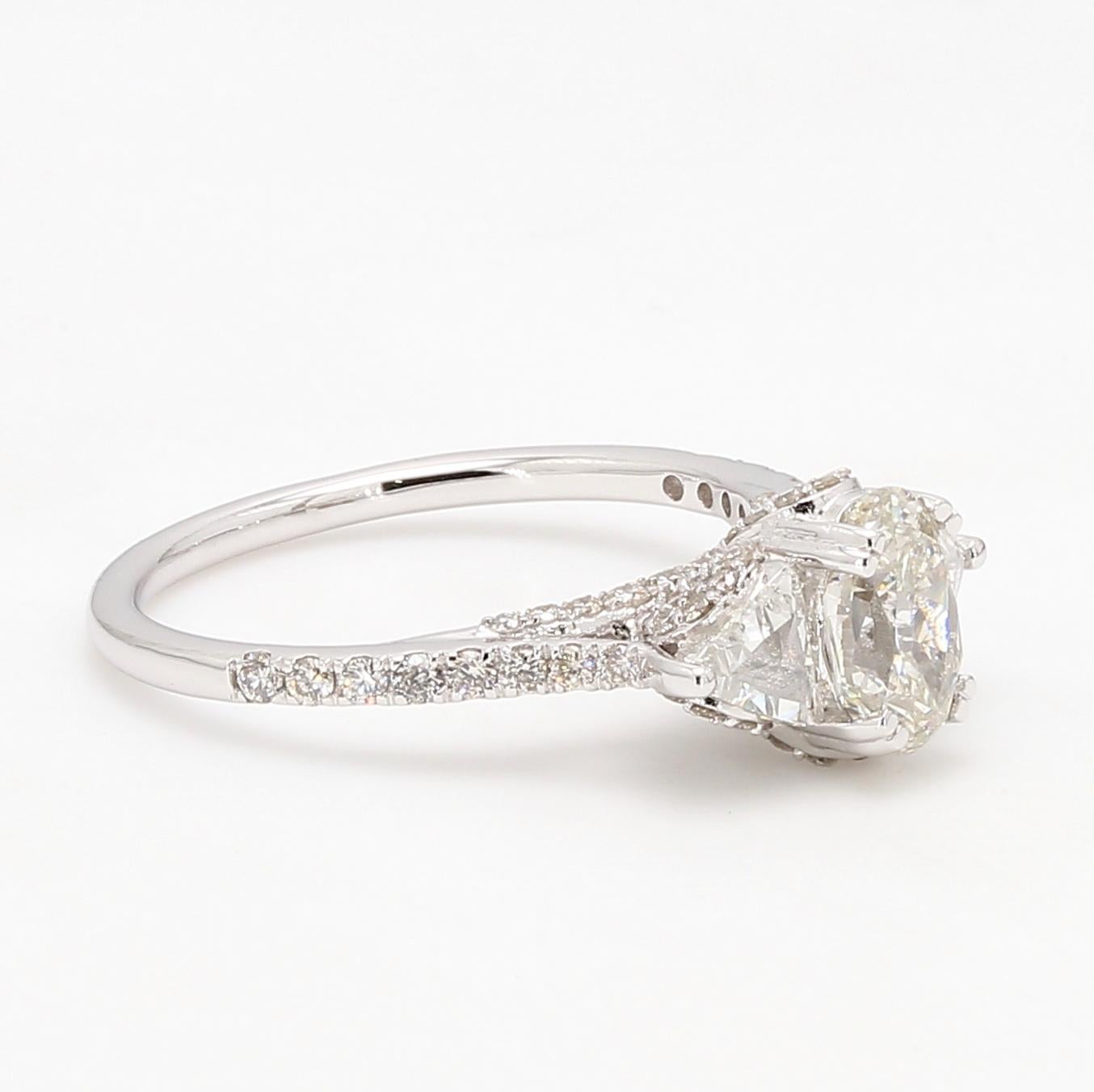 PANIM 18k White Gold European Old Cut Diamond Engagement Ring

Stunningly created in the Art Deco era, this sophisticated vintage-inspired piece! An eye-catching three-stone diamond ring. A 1 carat old cut diamond in the centre of the ring catches