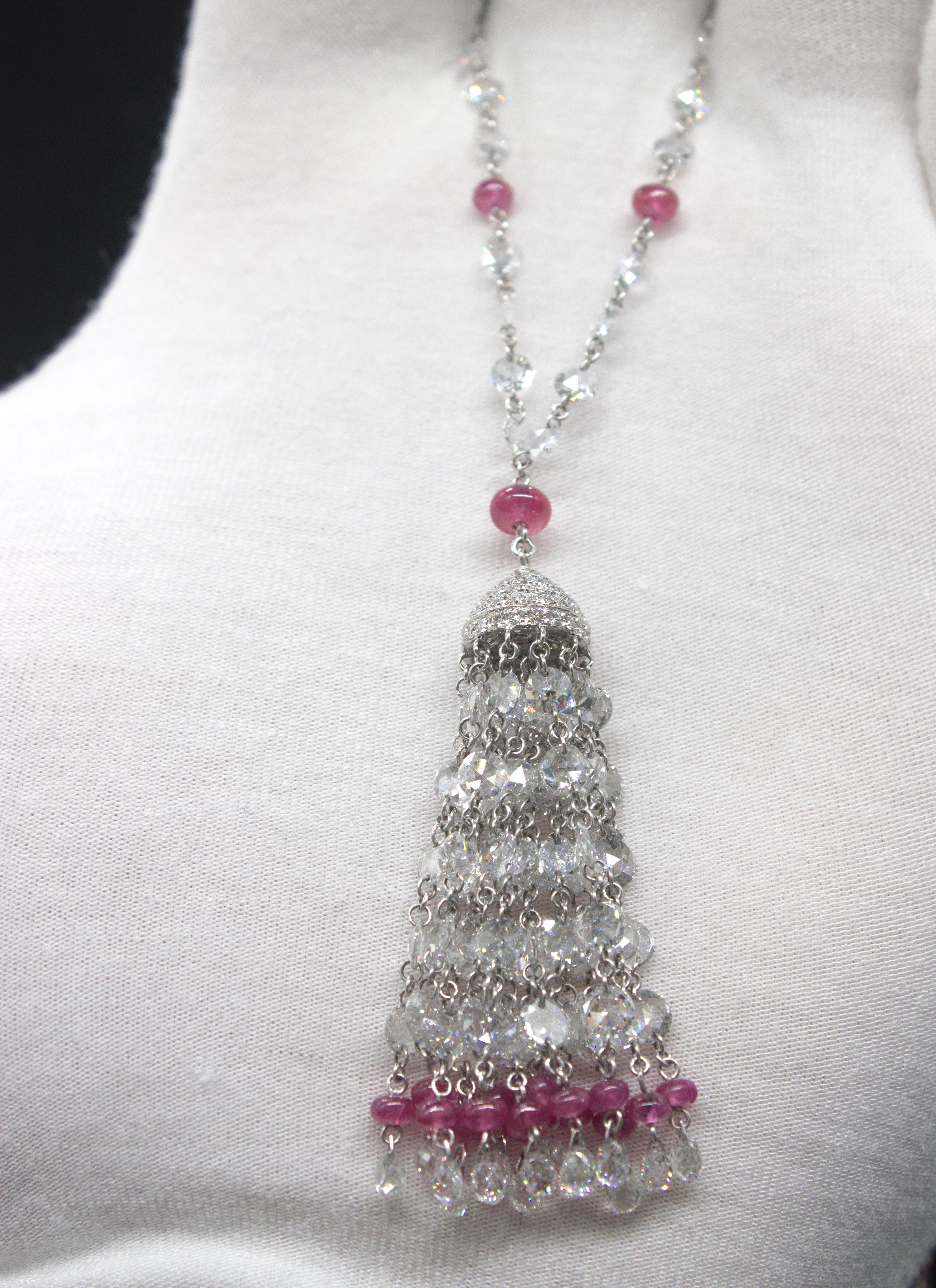 PANIM 19.23 Carat Diamond Rosecut & Ruby 18K White Gold Tassel Necklace

Mesmerizing approximately 20cts finely crafted Diamond Rosecuts with a melange of Natural Rubies weighting upto 9 cts. Subtly accentuated by a pavé diamond lobster clasp and