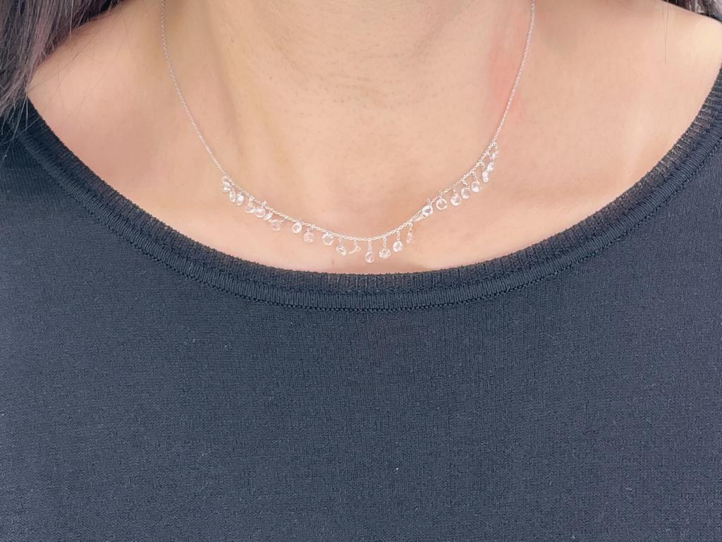 PANIM 2.29 Carat Diamond Rosecut 18K White Gold Dangling Necklace

This dangling necklace has a wonderfully warm feel thanks to the 18K gold and colourless Round Shape Diamond Rosecut . Each round diamond rosecut glints quietly when it catches the