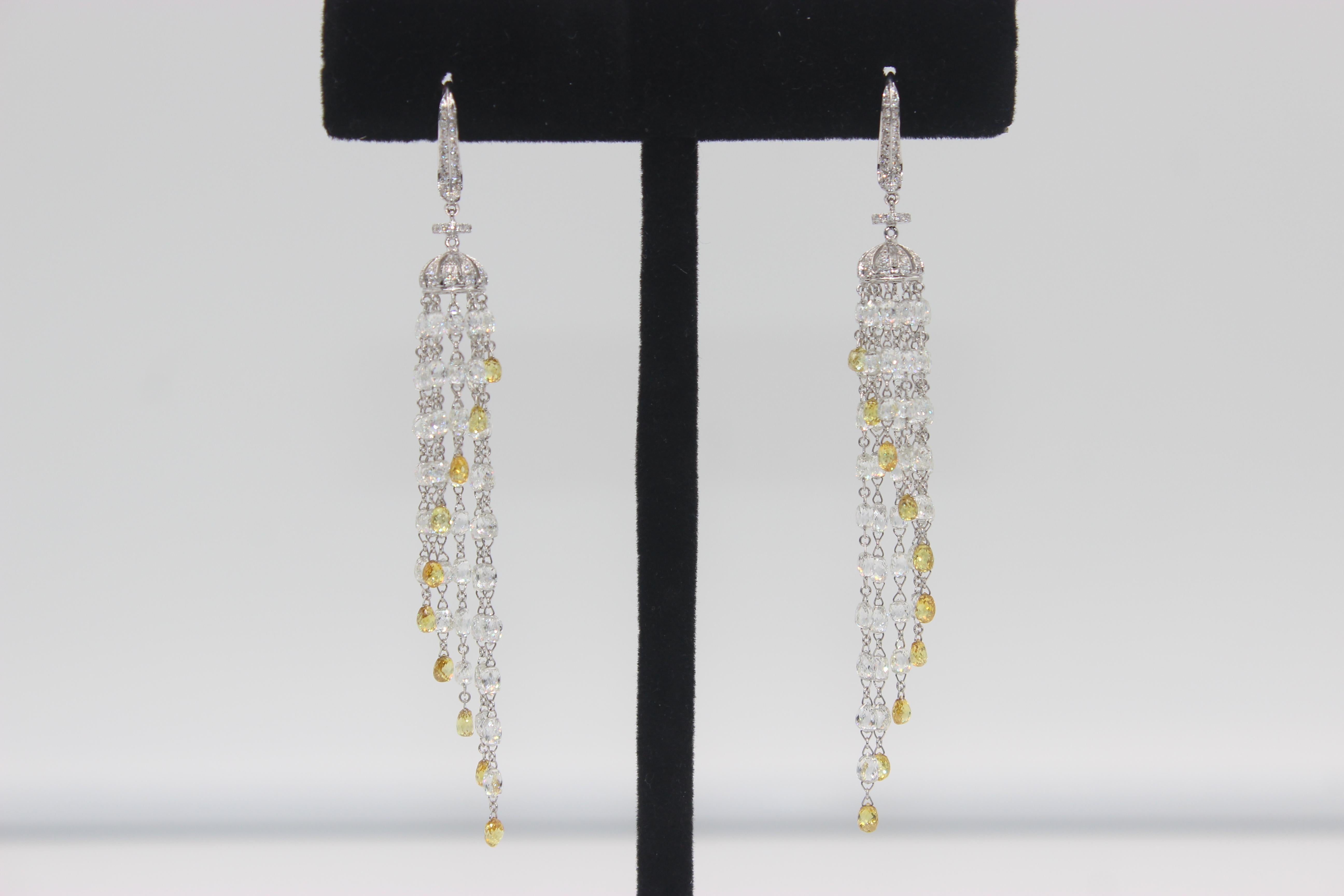 PANIM 23.18 Carats Diamond Briolette 18k White Gold Tassel Earrings

Part of our tassel collection, this beautiful earrings feature diamond briolettes and pave set sparkly round diamonds in dome like top. They are lightweight for a comfortable wear