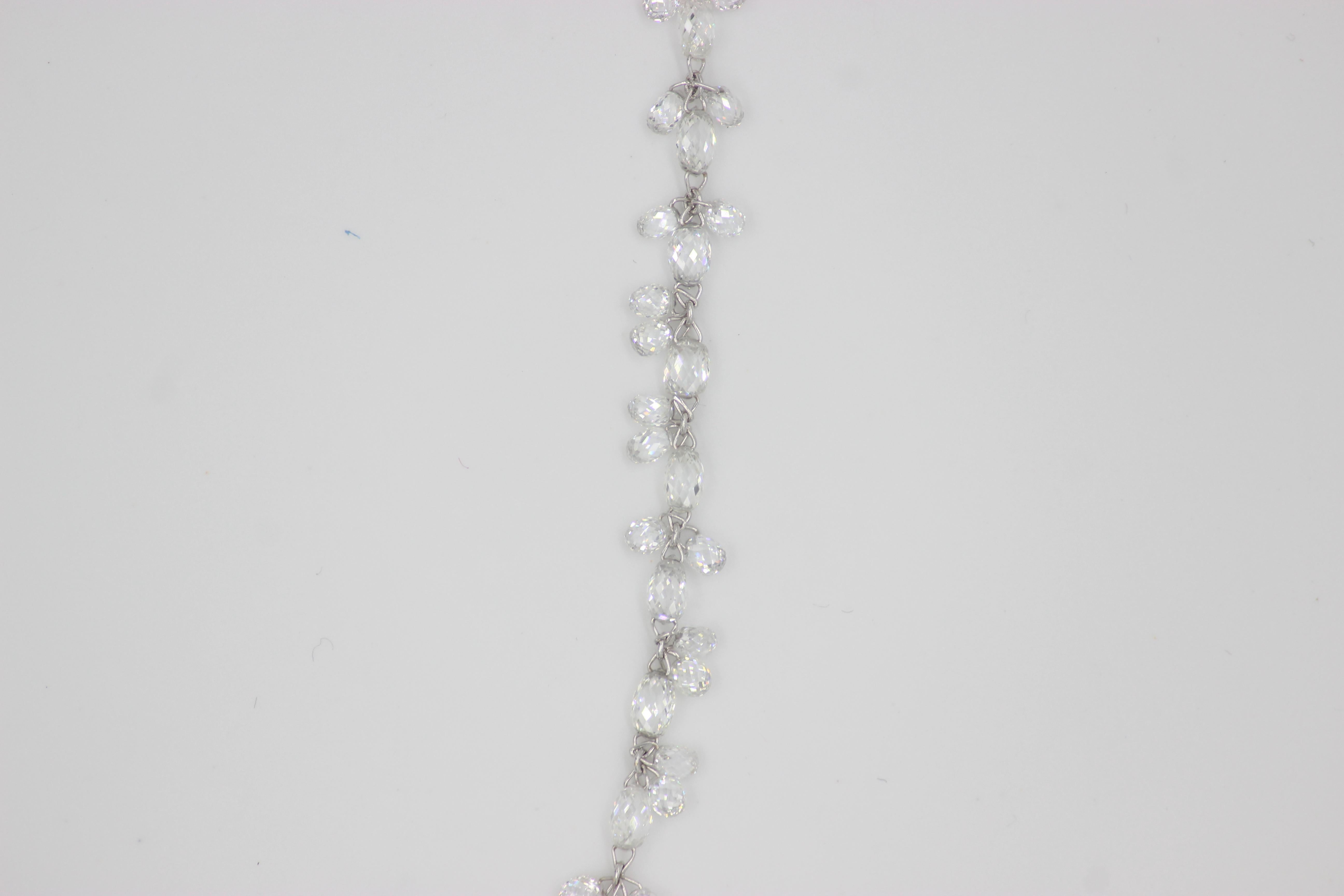 PANIM 26.45Carat Floral Briolette Necklace in White Gold Necklace

This statement necklace provides with a complete look in itself. Its Combination of two hole round Rose Cut Diamond & One Hole Dangling Pear Briolette cut diamond linked with 18
