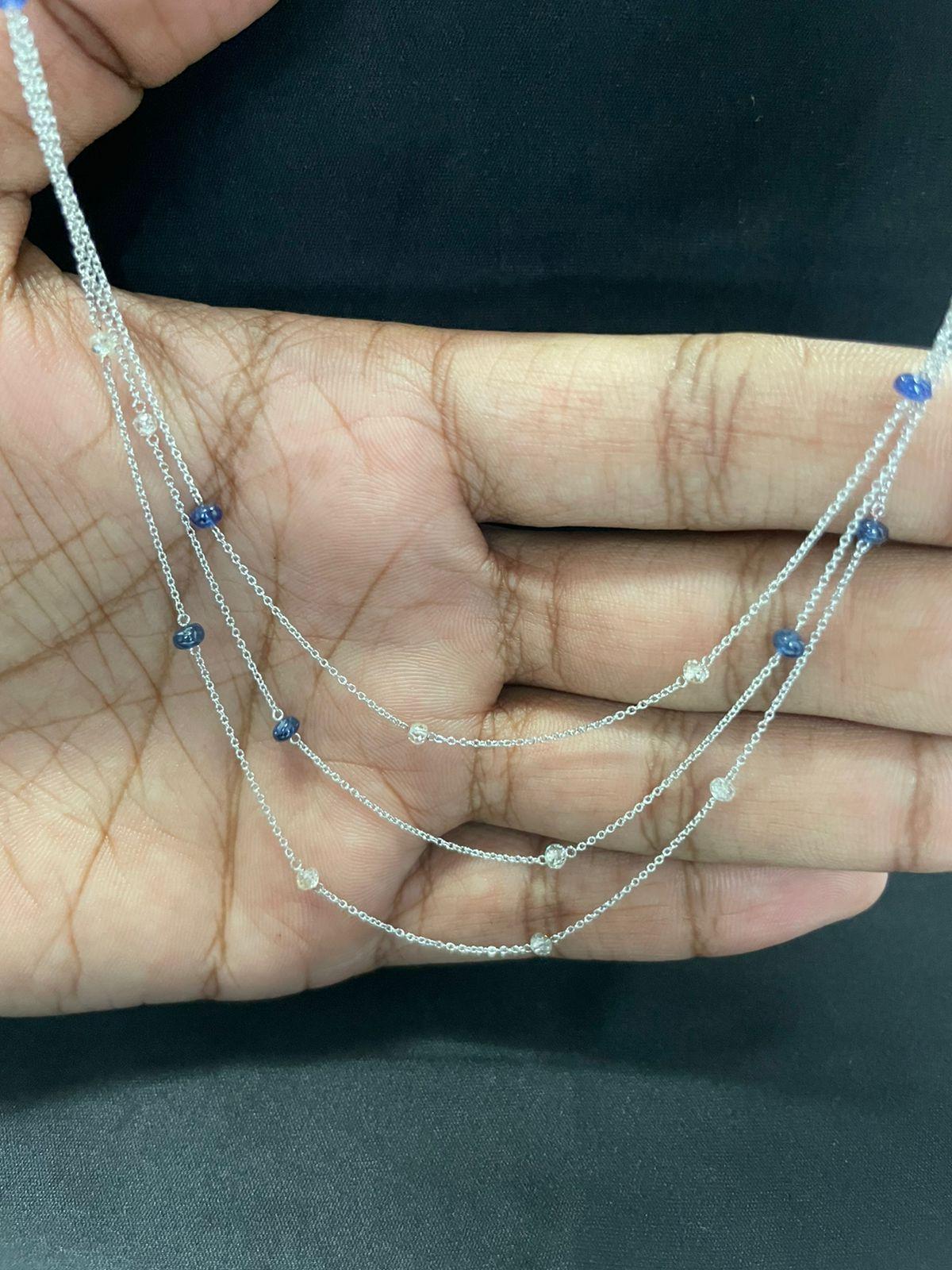 PANIM White Diamond Beads & Sapphire Tri Layer Necklace in 18 Karat White Gold

In this necklace Beads diamonds are evenly spaced on a white gold chain having a total of 3.80cts. This is a piece that can be worn everyday, alone or layered with other