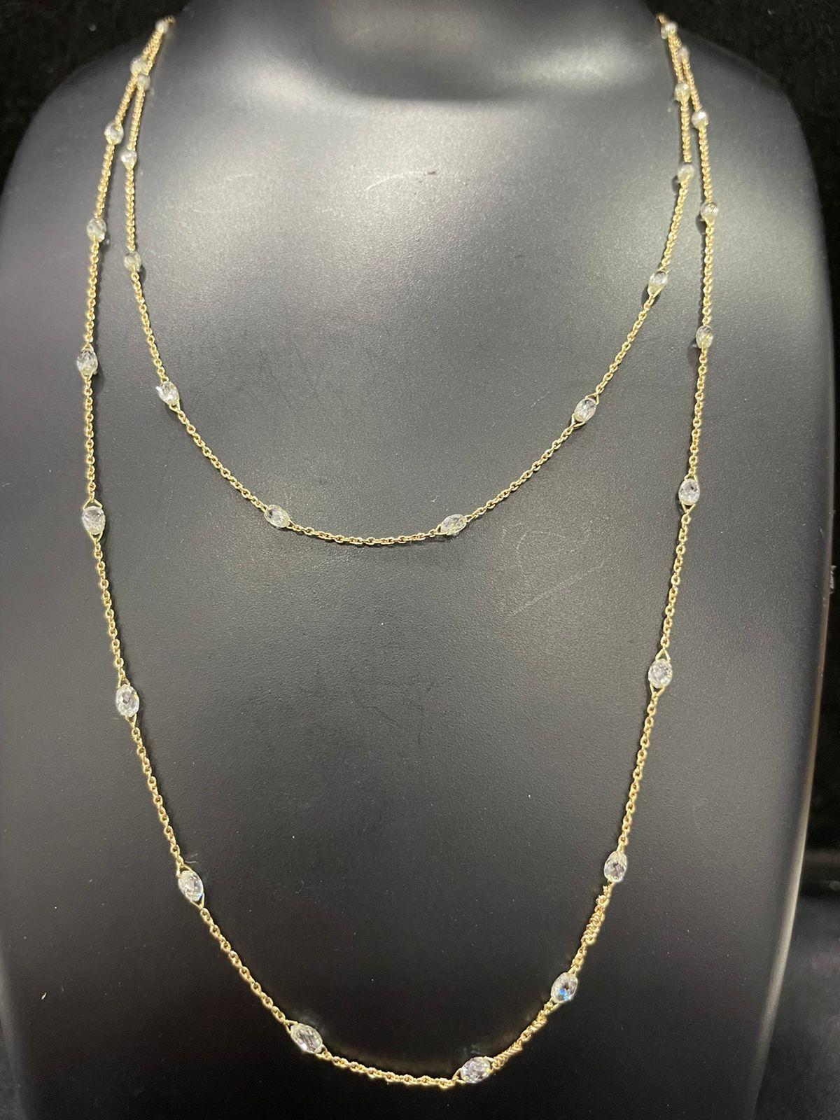 PANIM Briolette Diamond Circles Necklace in 18 Karat Gold

A daily wear necklace in 18K Yellow Gold with Briolette diamond weighing 5cts.

Specifications : 
Color : G+
Clarity : VS+

Length : 32inches(can be customized)

Customization available in