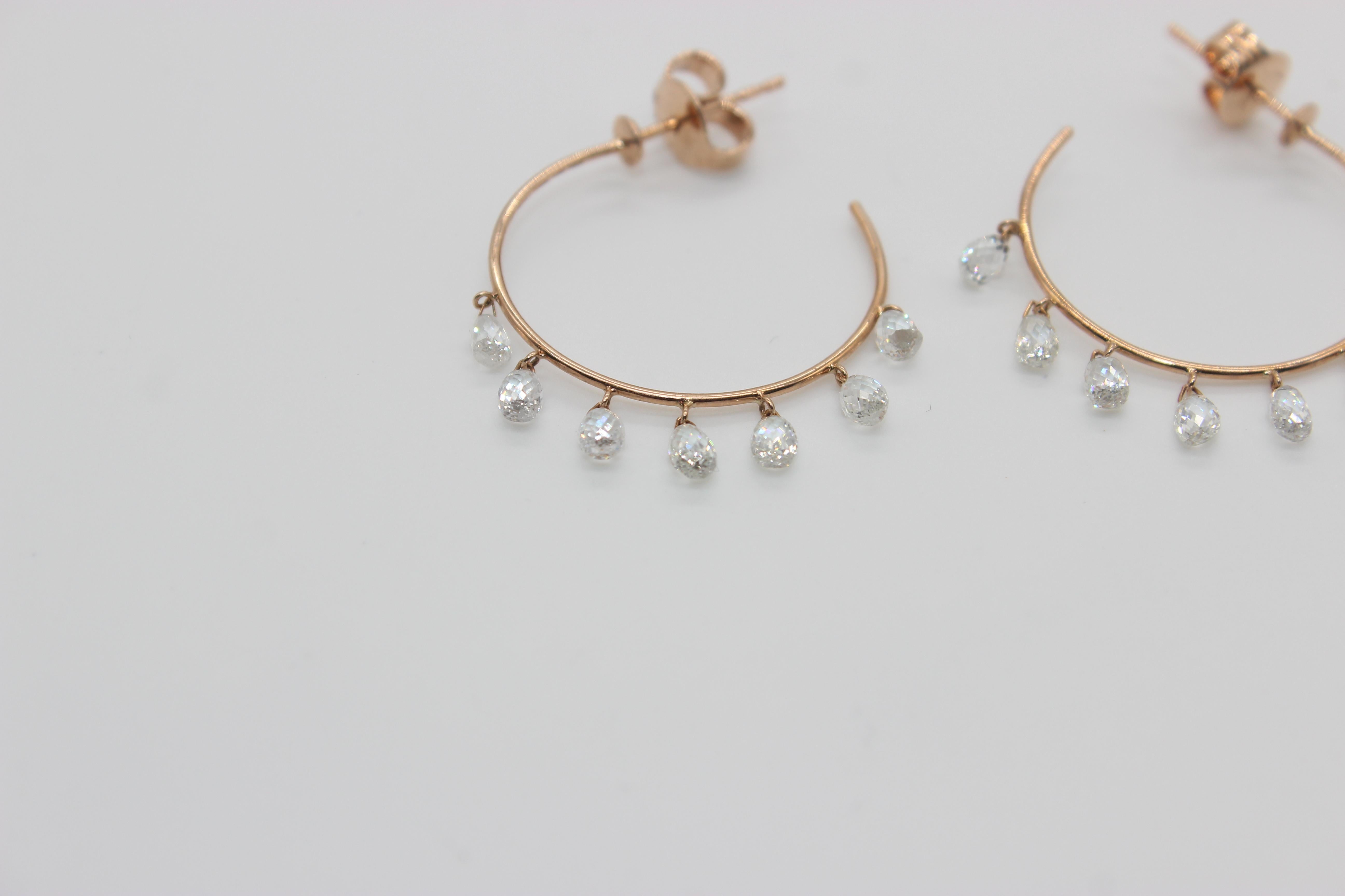 Elevate your attire and make a statement with the sparkling diamond hoop earrings to boost your everyday look. Up your hoop game by adding pendants and make it truly personal. Set in 18ct Rose Gold, each hoop contains 7 ethically sourced diamond