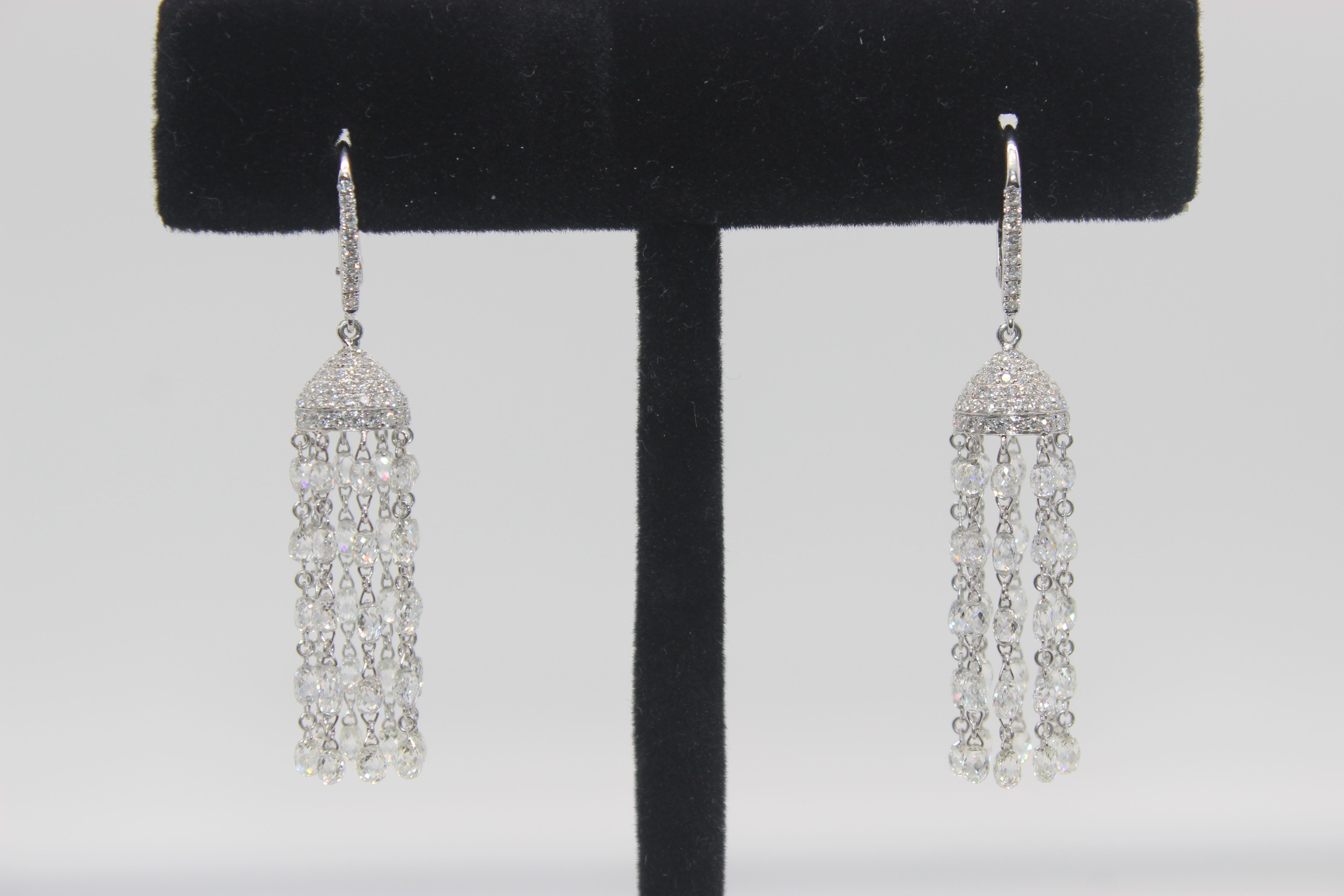 PANIM Diamond Briolette 18K White Gold Tassel Earrings

Panim Diamond Briolette Tassel Earrings are a gorgeous and unique pair of earrings that are sure to make a statement. The earrings feature sparkling diamond briolettes, which are pear-shaped