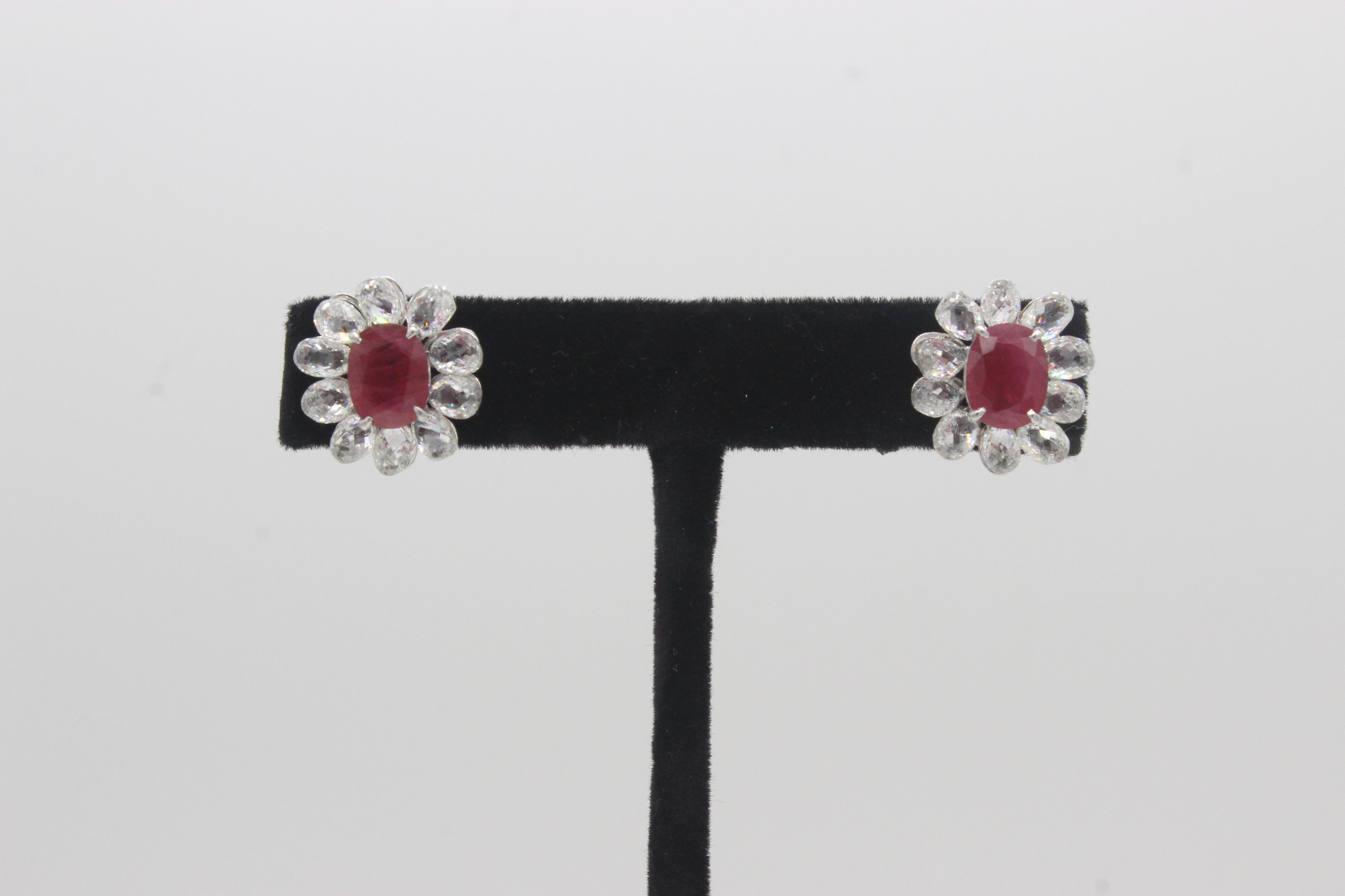 PANIM Diamond Briolette and Ruby 18k White Gold Stud Earrings

These exquisite 18k white gold Panim diamond stud earrings feature a ruby in the centre and gorgeous briolette-cut diamonds with a total diamond weight of 9.59 ct. around it. These