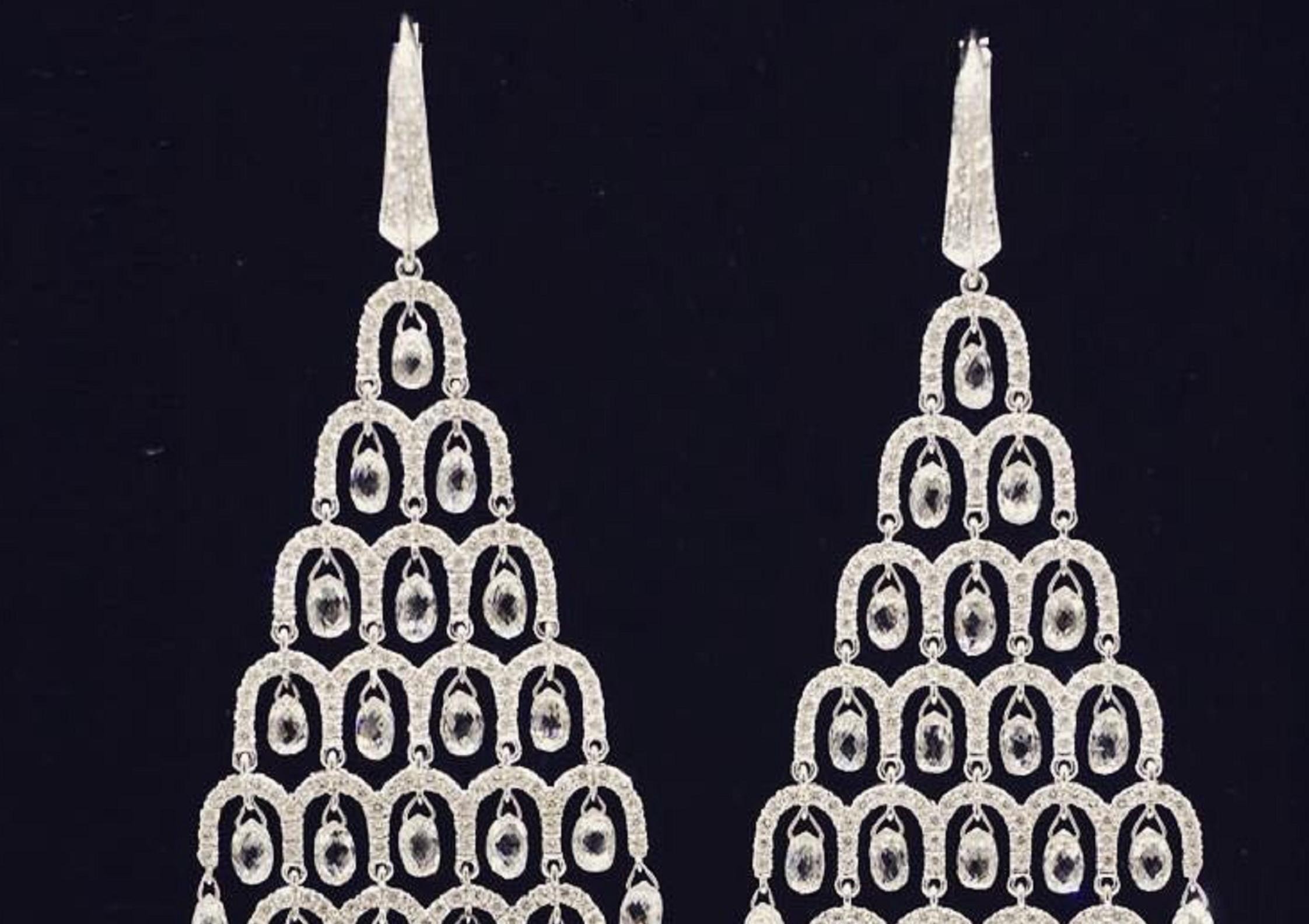 PANIM Diamond Briolette Chandelier 18K White Gold Chandelier Earrings

Presenting an amazing long chandelier earrings of enticing and favorite drop shaped diamond briolettes earrings approximately 10cts in 18K White Gold with ascending rows from 1
