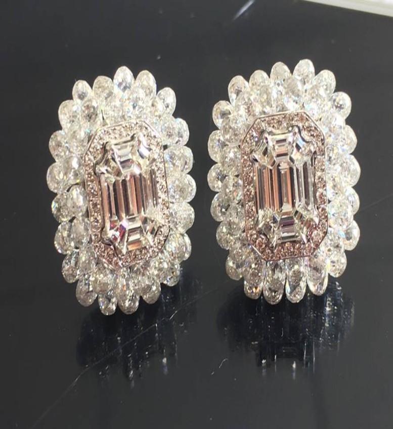 PANIM Diamond Briolette & Illusion 18K White Gold Stud Earrings
These elegant diamond briolette stud earrings are part of Panim's innovative collection, with an emerald illusion diamond centre set in 18k white gold, a halo of pave diamonds, and two
