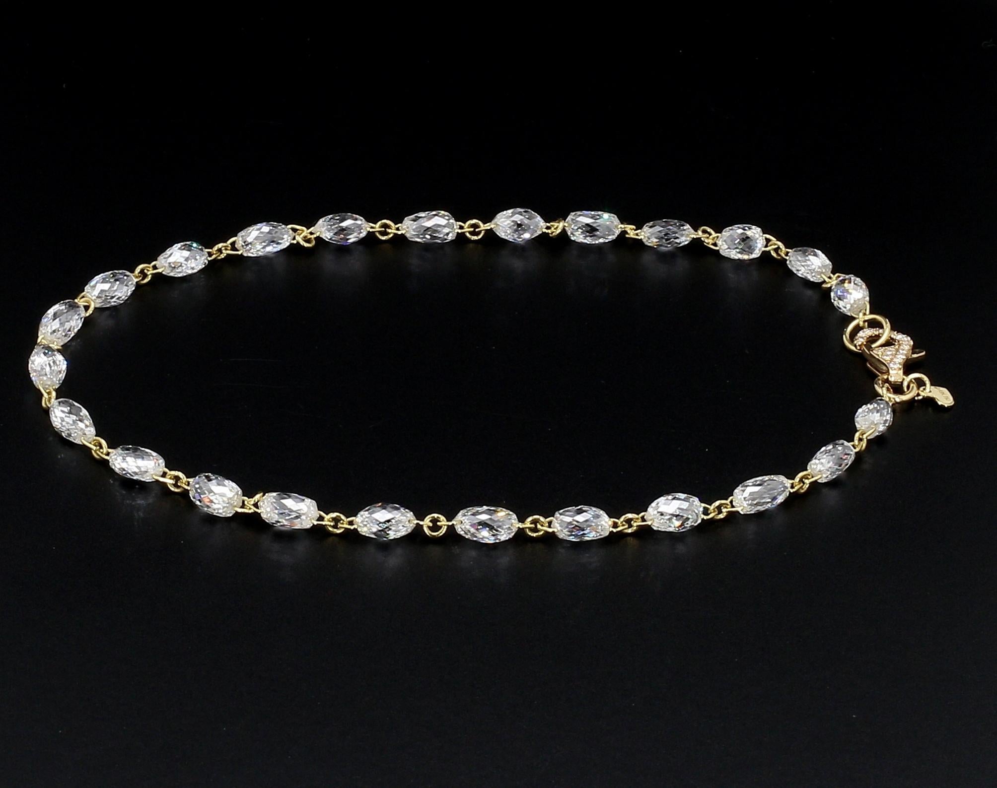 PANIM Diamond Briolette Link Chain 18 Karat Yellow Gold Bracelet

CODE: BLT-0018

7.75 carats of White Briolette-cut Diamonds set in a Bracelet made in 18KT White gold weighing total 2.328 gms with Diamond Studed Lobster Lock.

Available in 18K