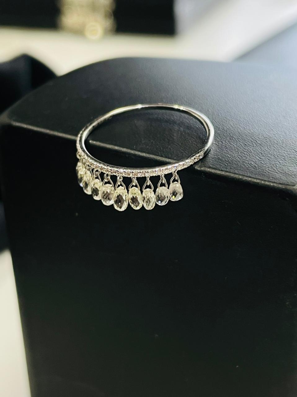 PANIM Diamond Briolettes 18K White Gold Dangling Ring

Inspired by the beauty of a rain drop, Our eccentric Dangling diamond ring is an absolute show-stopper. it has 10 pieces Rain Drops Diamond Briolettes set with Round Diamond.

Ring Size US