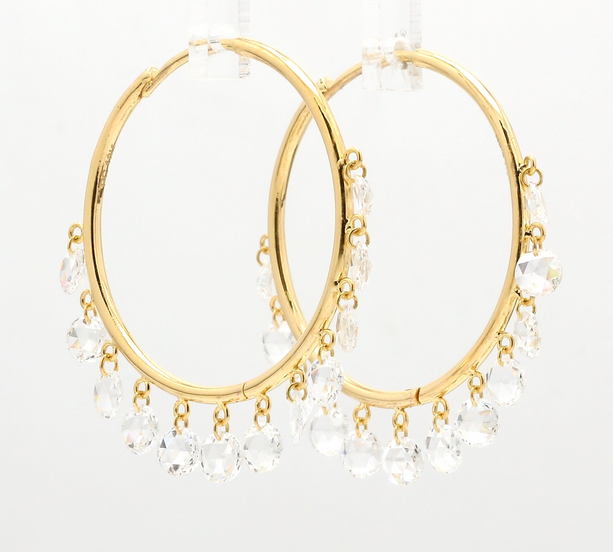 PANIM Diamond Rosecut Hoop 18k Yellow Gold Earrings

Change it up with this Panim Diamond Rosecut hoop instead of a traditional gold hoop or an all-diamond hoop. For a fresh look, this contemporary version features 24 round shape rosecut diamonds