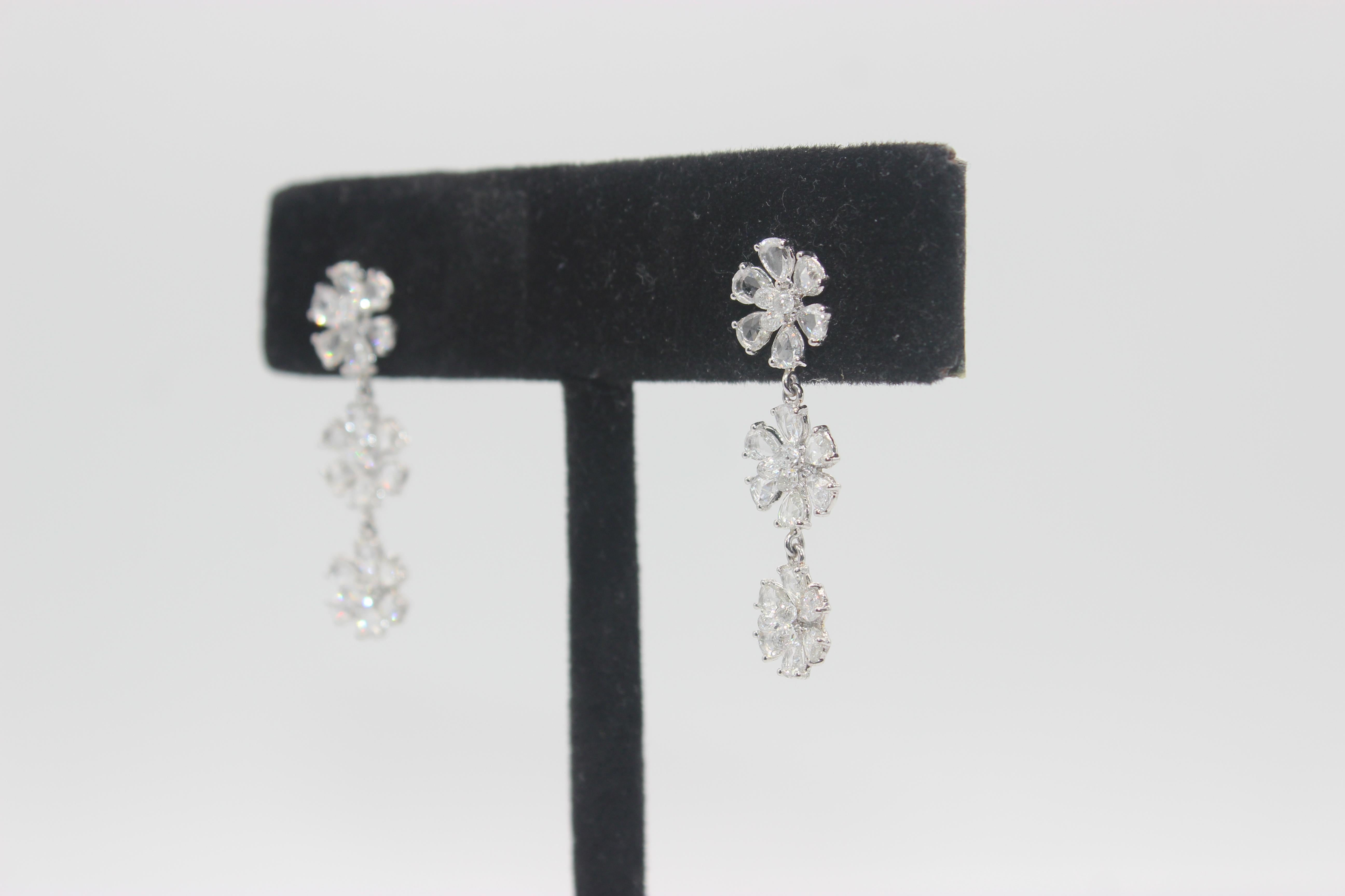 PANIM Diamond Rosecut and Briolette 18k White Gold Floral Earrings

Incredible diamond earrings are the acme of luxury.Diamond rosecut petals and a briolette sit in the core of these beautiful, highly polished 18 karat white gold earrings. Inspired