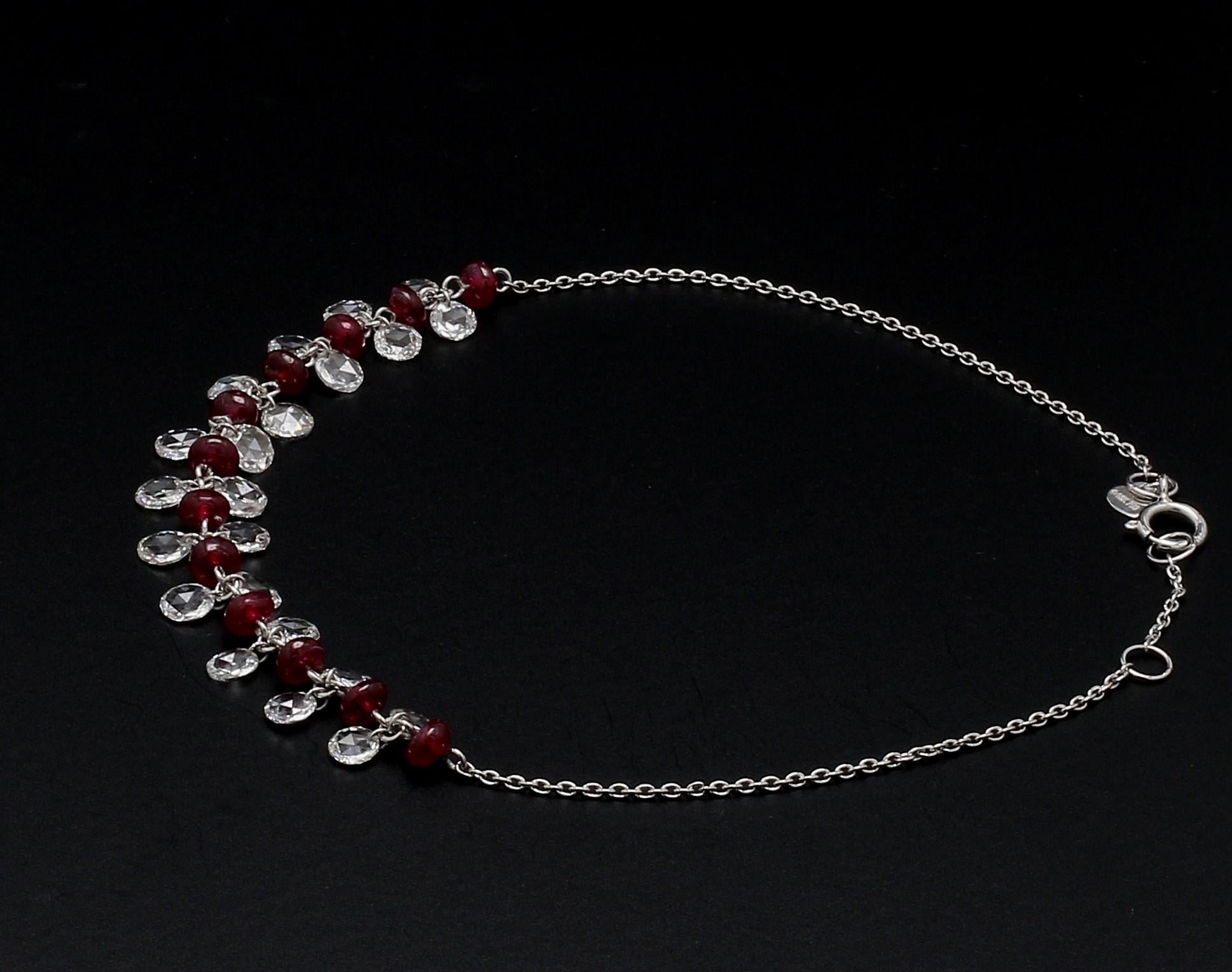 Panim Rose Cut Diamond And Ruby Dangling Bracelet in 18 Karat White Gold

Our dangling rose-cut diamond bracelet is extremely wearable. Its versatility and classic design make it a great accompaniment to various occasions. Beautifully made with