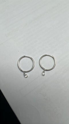 Orecchini a cerchio "Huggie" PANIM con diamanti taglio Rosecut in oro bianco 18 carati
