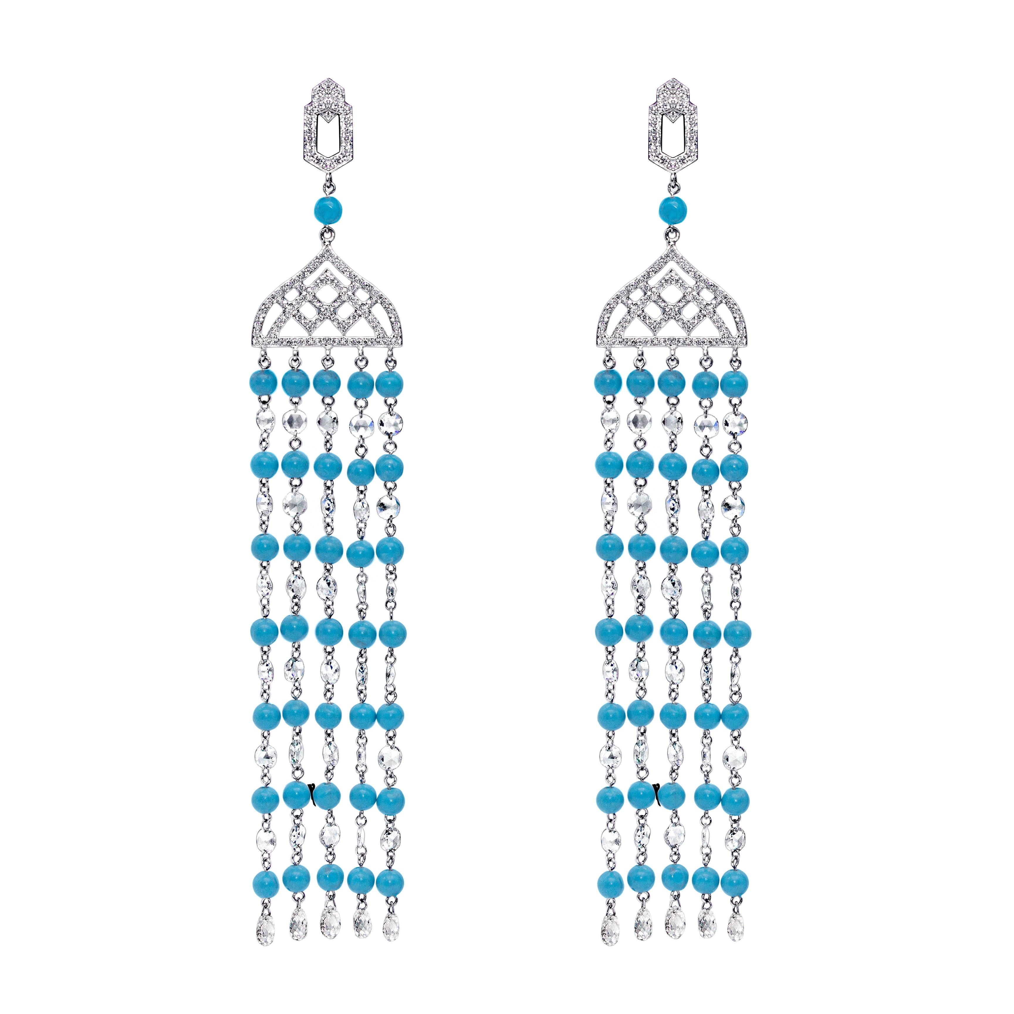 PANIM Rosecut Diamond & Turquoise Tassel Earring in 18 Karat White Gold 

Inspired by nature, our Signature Waterfall Collection Earrings is full of brilliance and sparkle, this Rose cut diamond earring with Turquoise will make a perfect piece for